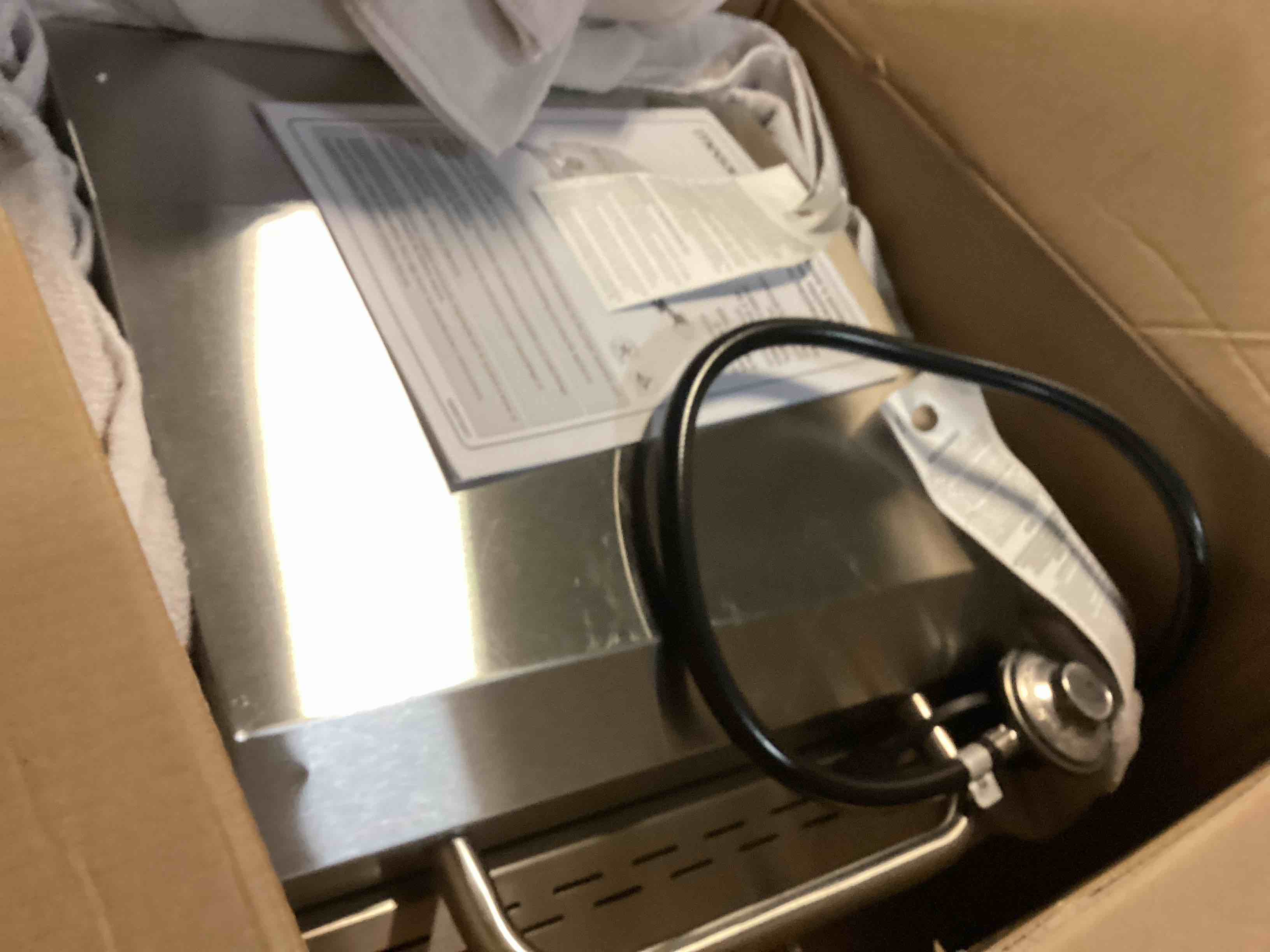 https://s3.amazonaws.com/lotting-images-prod/bidfta/ORG5616379_1702300788835.jpeg