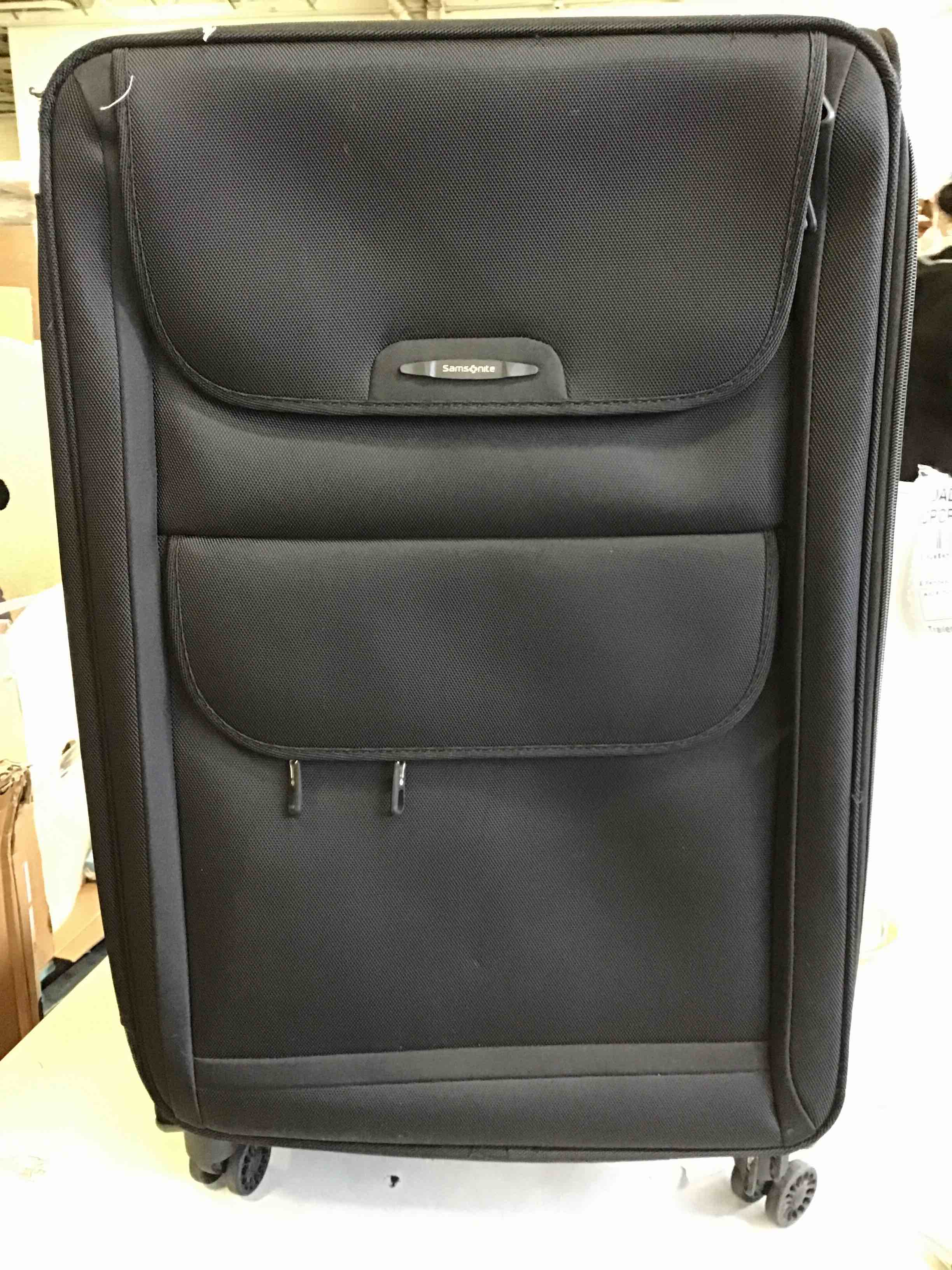 Samsonite black rolling luggage with front pouches 