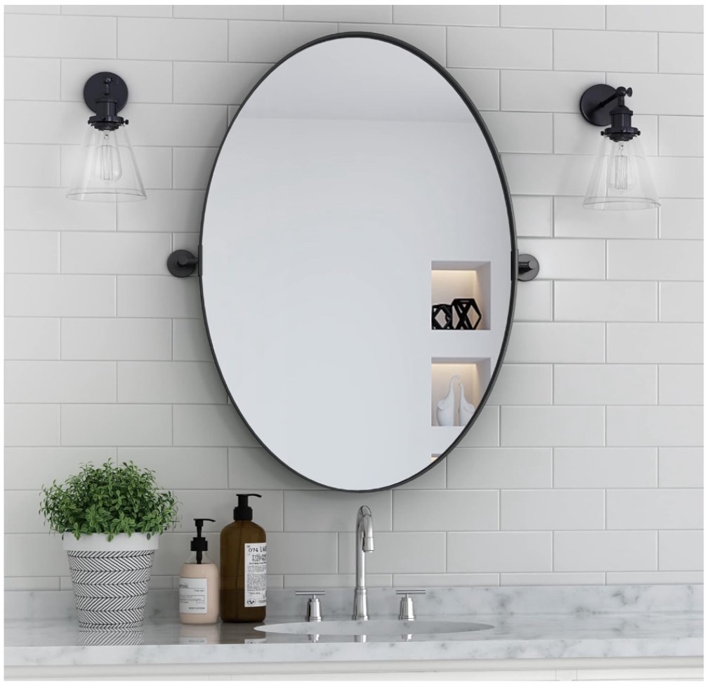 Oval Wall Mirror for Bathroom 24 x 36 Inch Pivot Wall Mounted Vanity Mirror Black Metal Frame Decorative Oval Mirrors for Bedroom Living Room