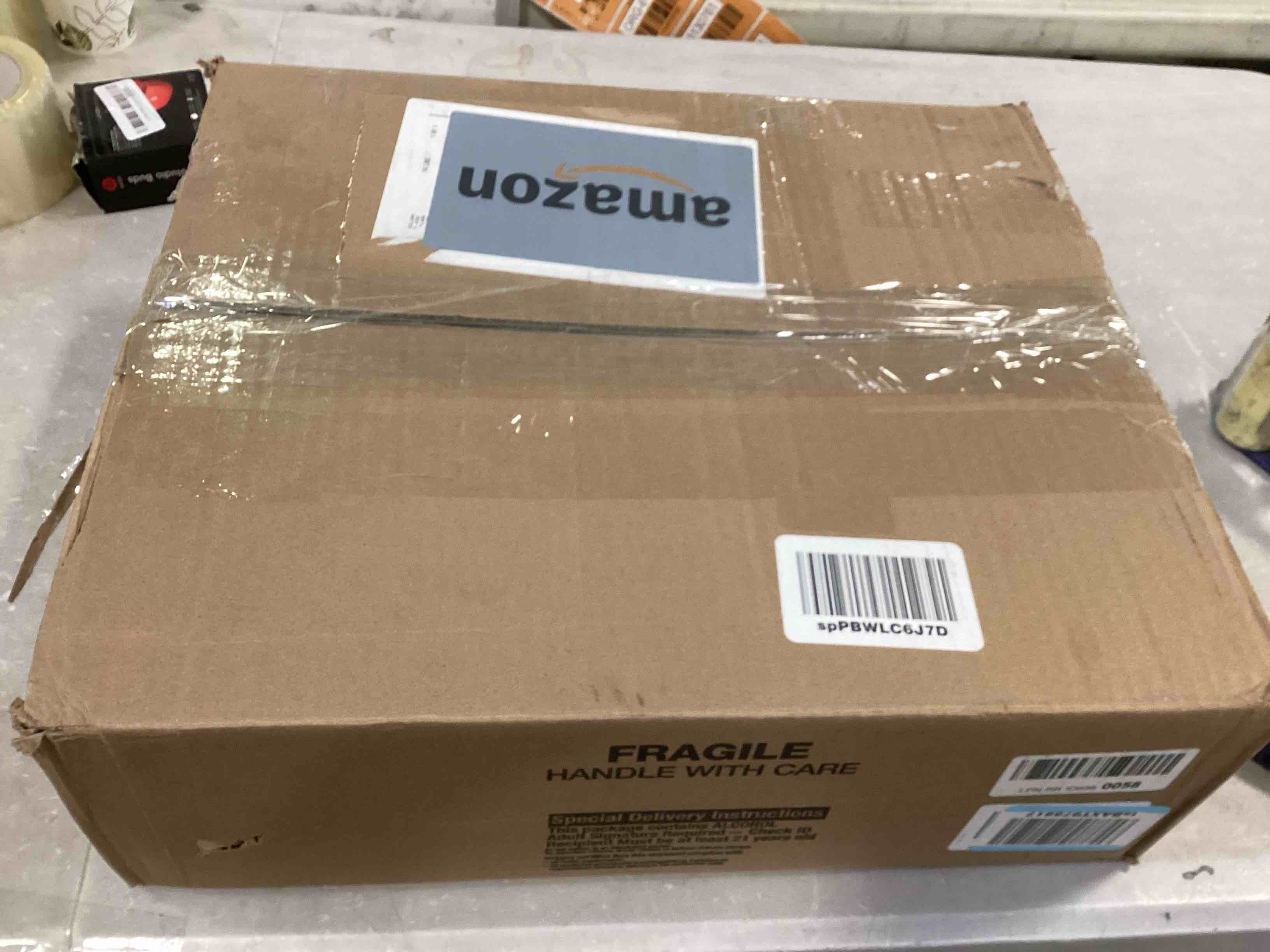https://s3.amazonaws.com/lotting-images-prod/bidfta/ORG6005284_1709148450672.jpeg