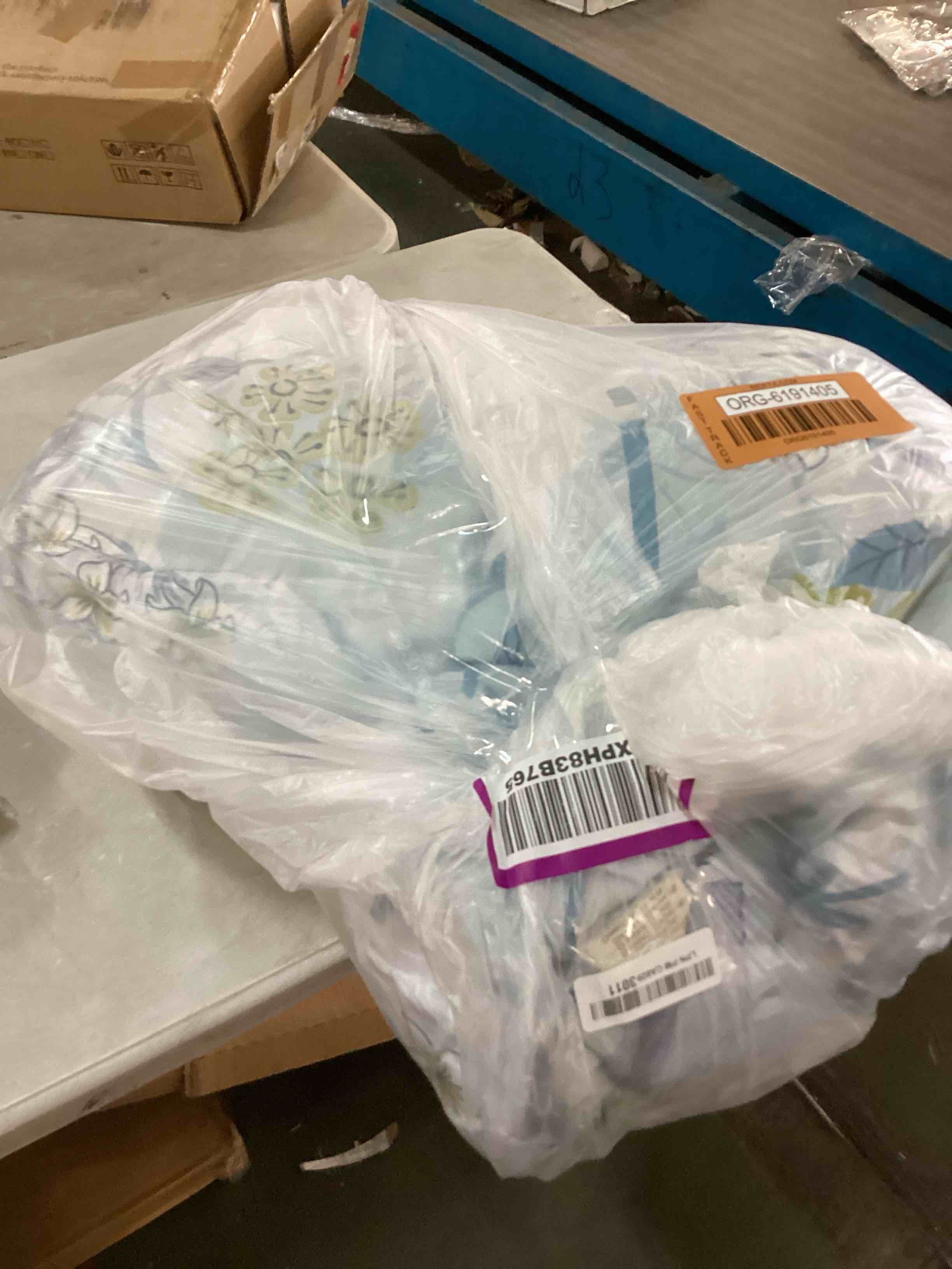 blue cover with yellow flowers on it