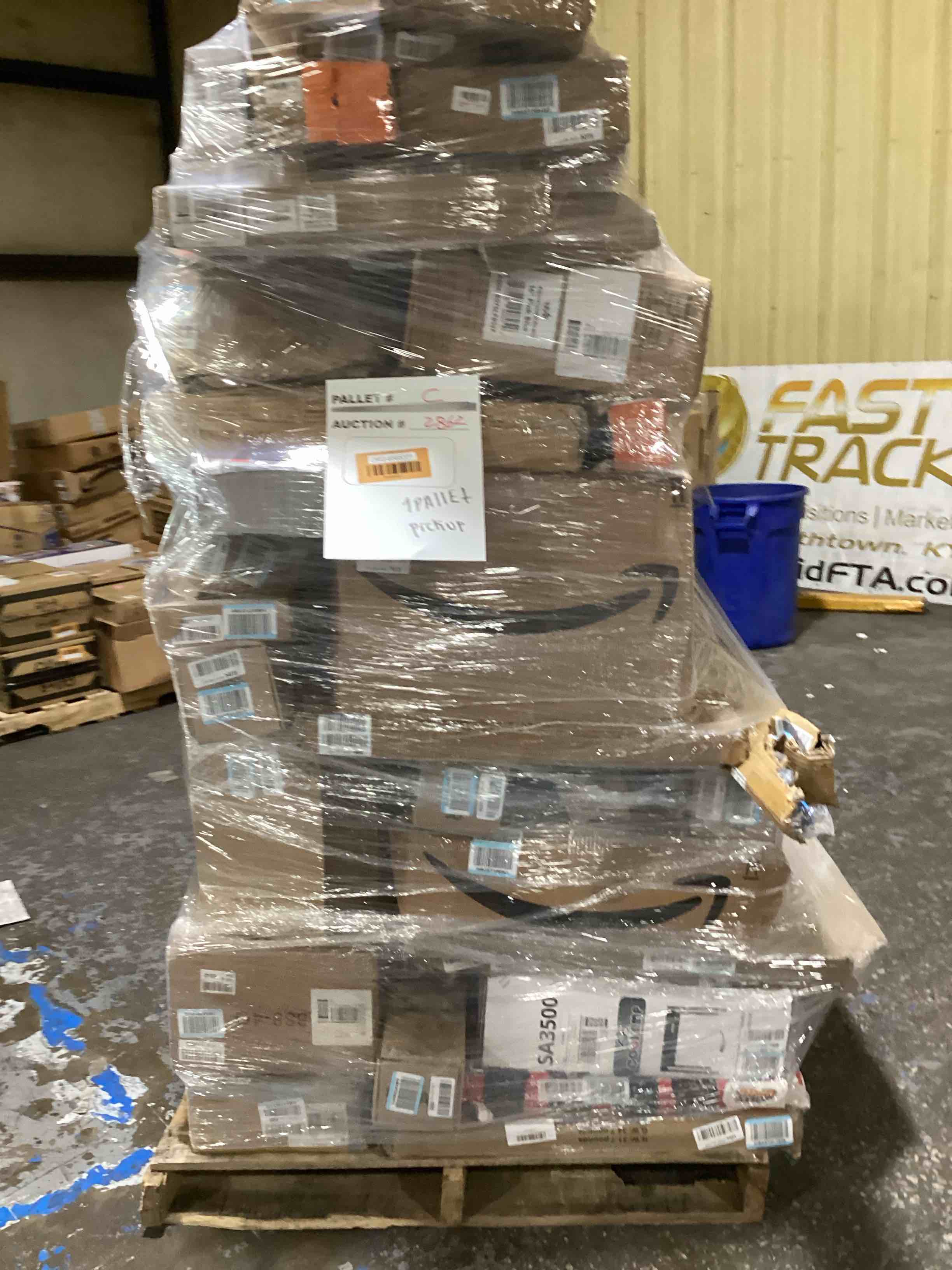 C. skid pallet boxes surprise ( good condition or as is) 30 items or more