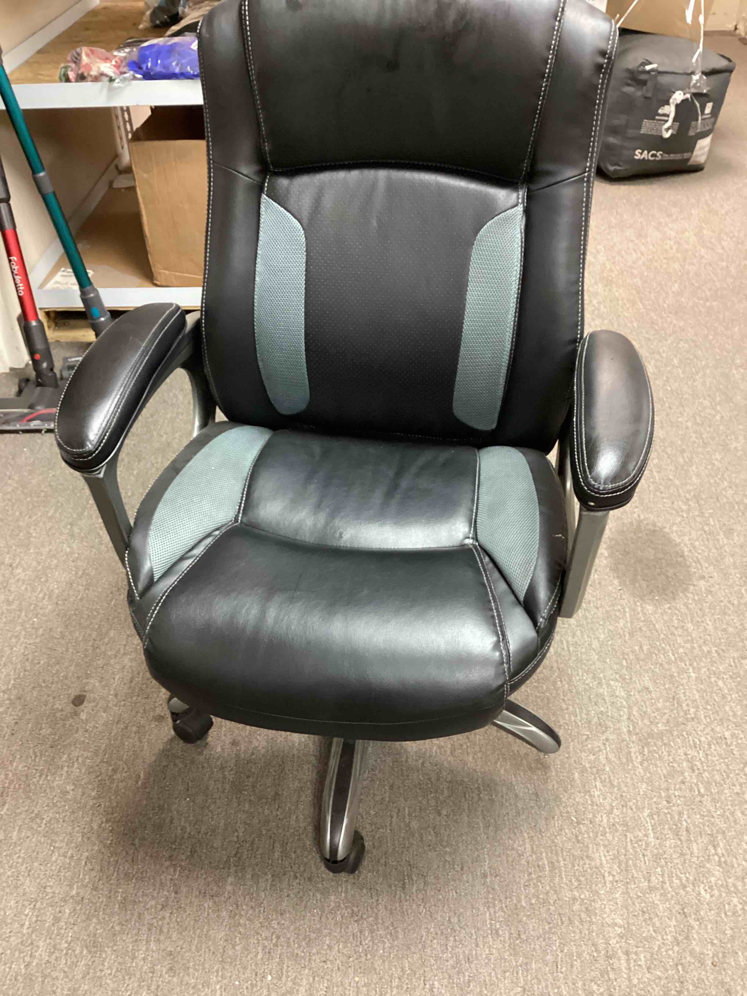 Amazon Basics Executive Home Office Desk Chair with Padded Armrests, Adjustable Height, Rolling Swivel Chair, 275 Pound Capacity, Black and Silver  (missing a wheel)