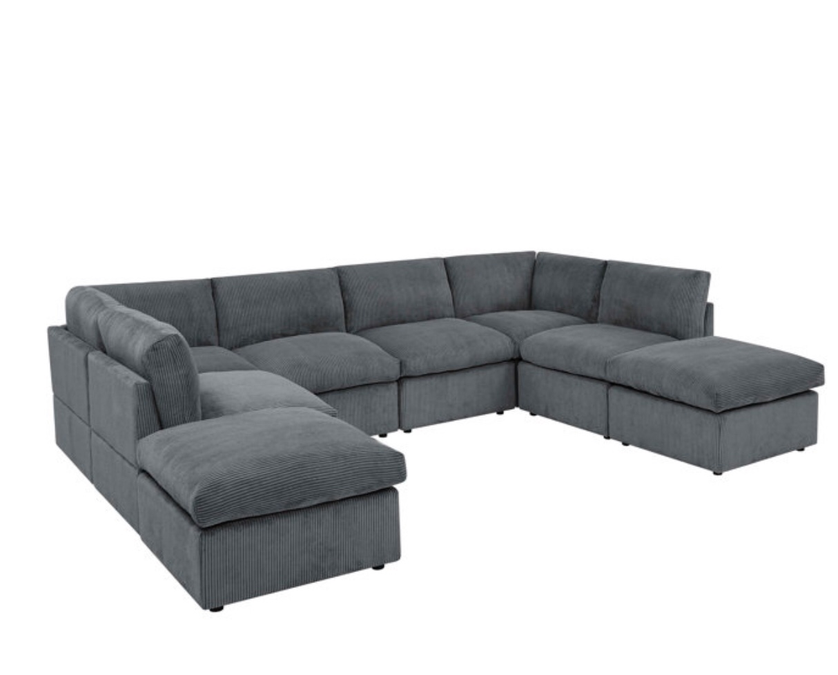 Arvill Amuri 129'' Wide Symmetrical Modular Corner Sectional with Ottoman( incomplete 1 piece only) 