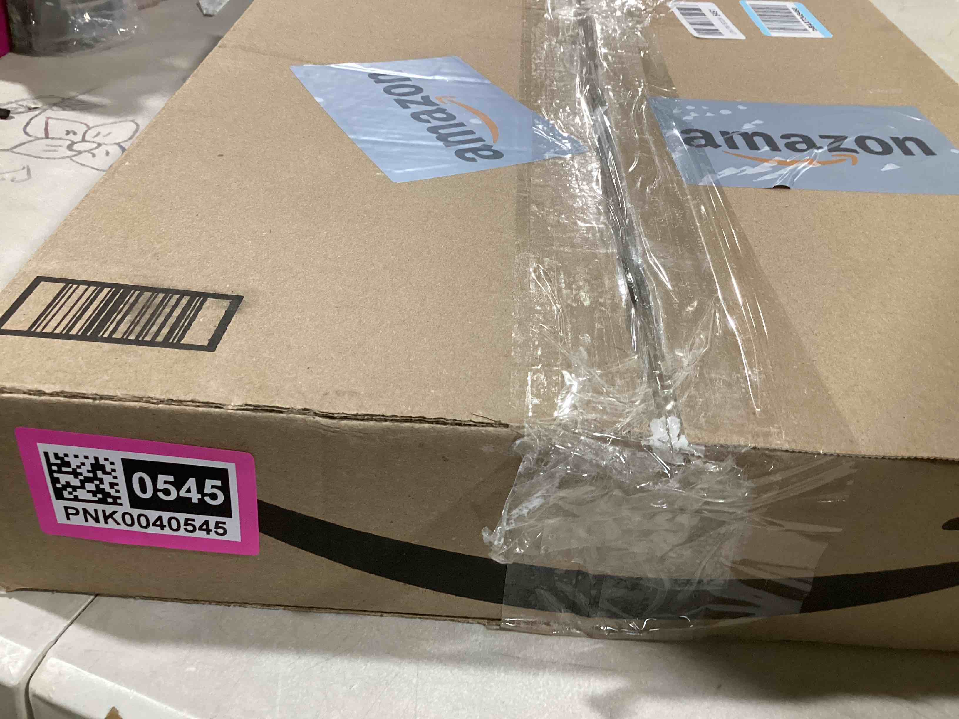 https://s3.amazonaws.com/lotting-images-prod/bidfta/PNK0040545_1733428670850.jpeg