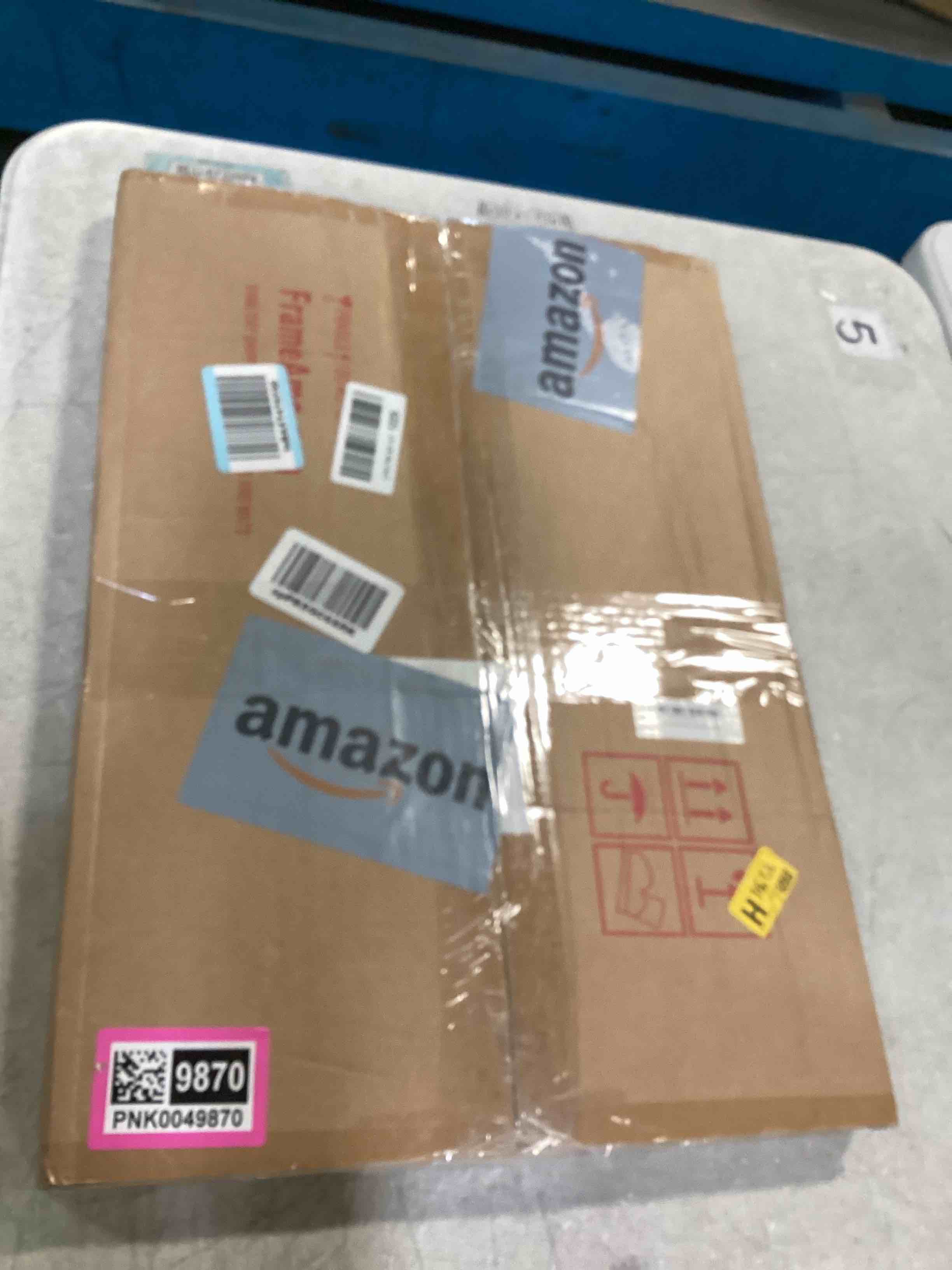 https://s3.amazonaws.com/lotting-images-prod/bidfta/PNK0049870_1723649987488.jpeg