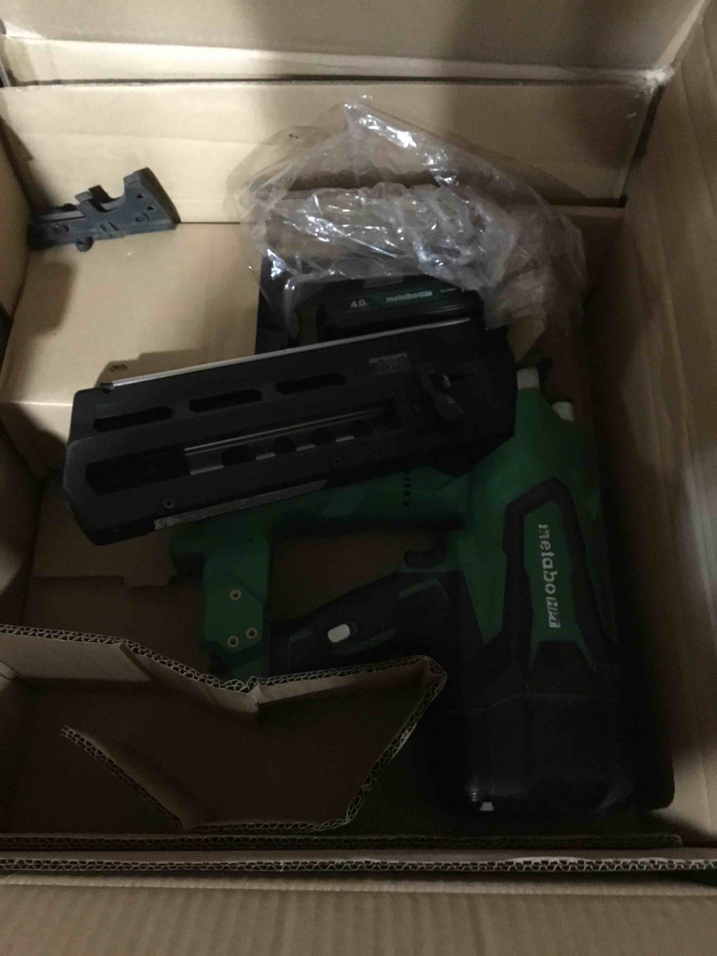 Condition photo showing As Is for metabo hpt 18v multivolt cordless 21° framing nailer kit, 3-1/2" plastic strip framing cordless nailer, power tool with 4.0ah lithium ion battery, drives 2" to 3-1/2" nails, nr1890dra nr1890dra - lighter, smaller, & more powerful