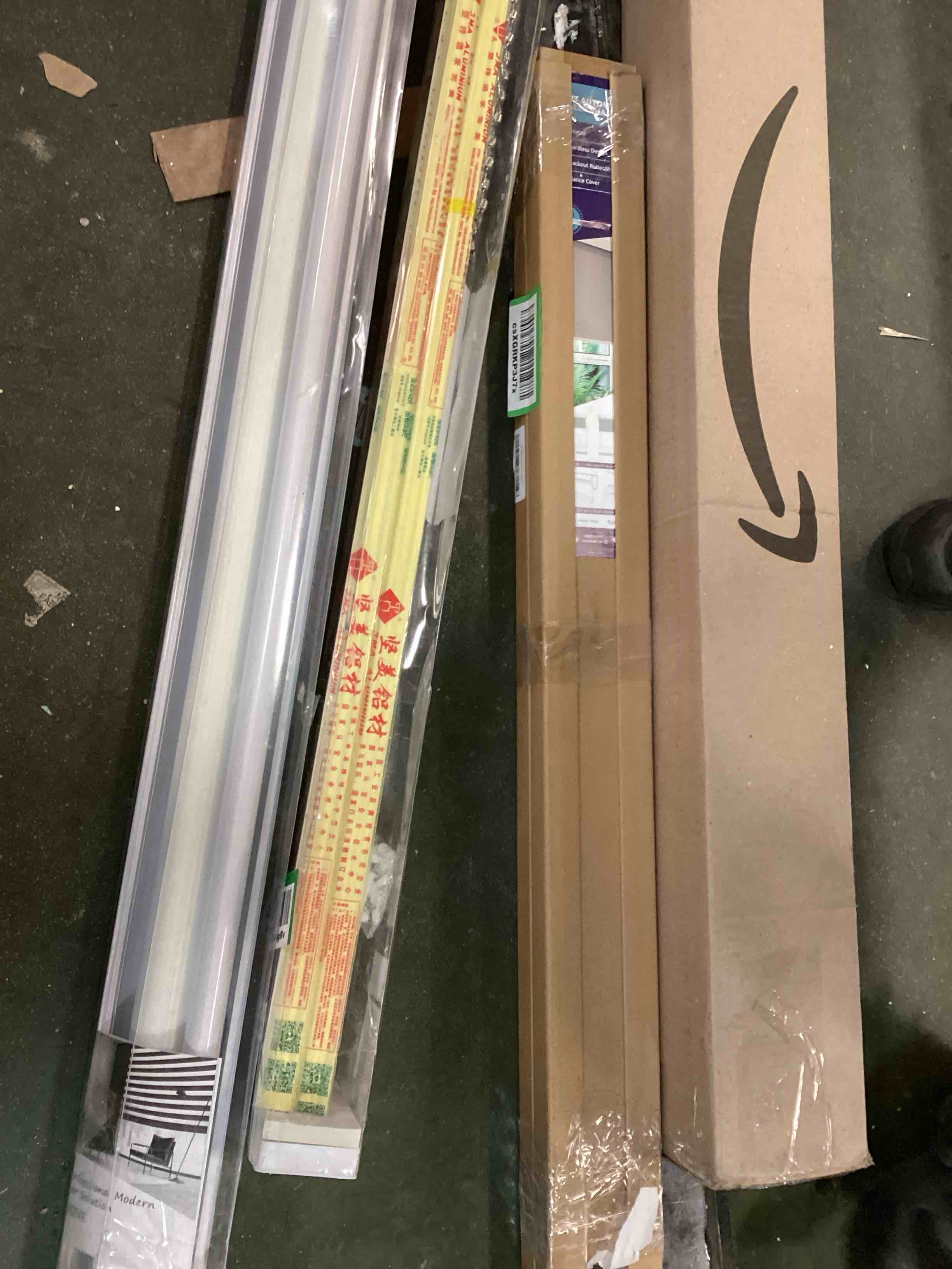 Assortment of Miscellaneous products (May Include cordless shade, curtain rods, retractable baby gate, Led universal linear lamp and more or other use)