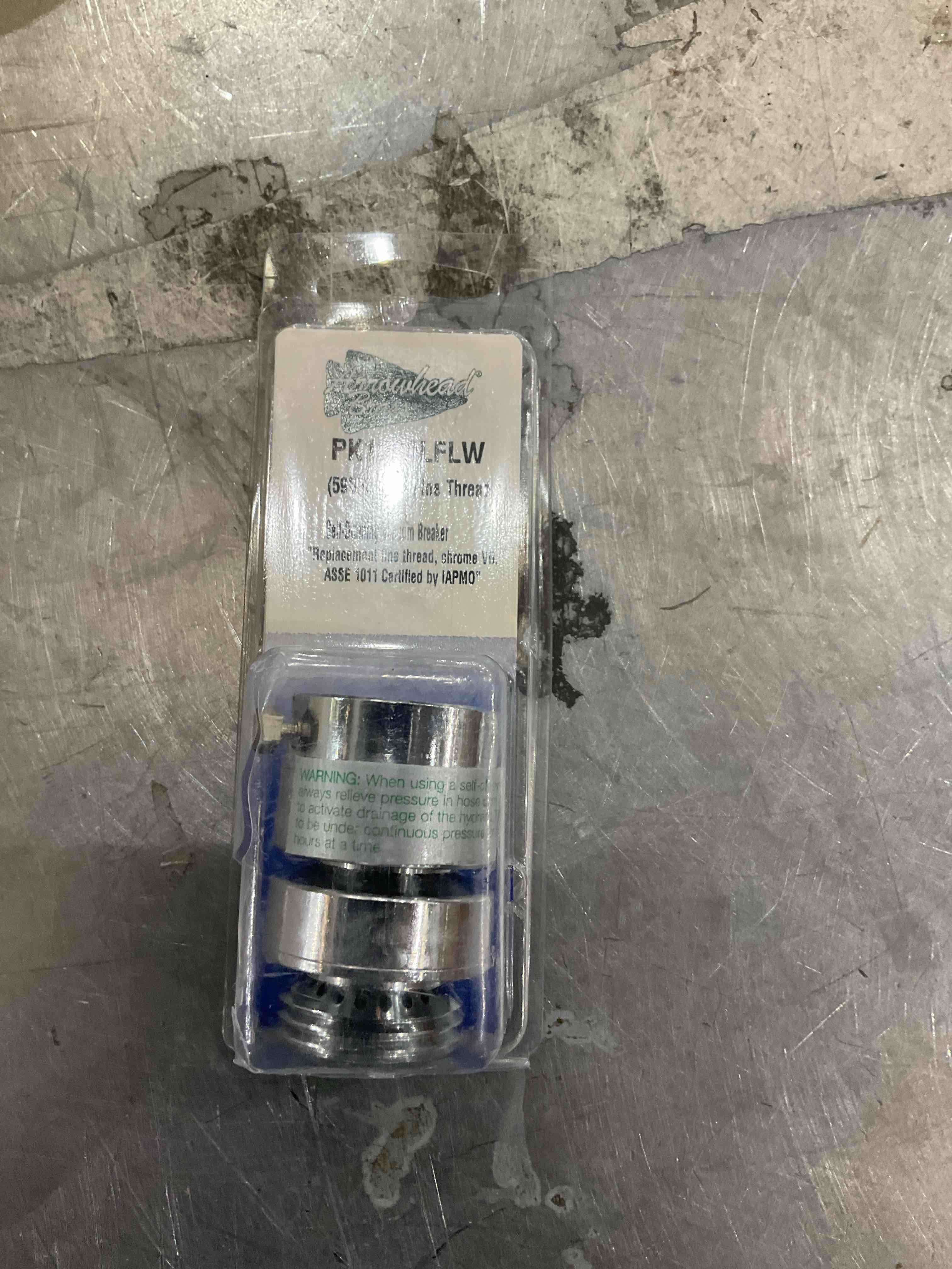 Self draining vacuum breaker