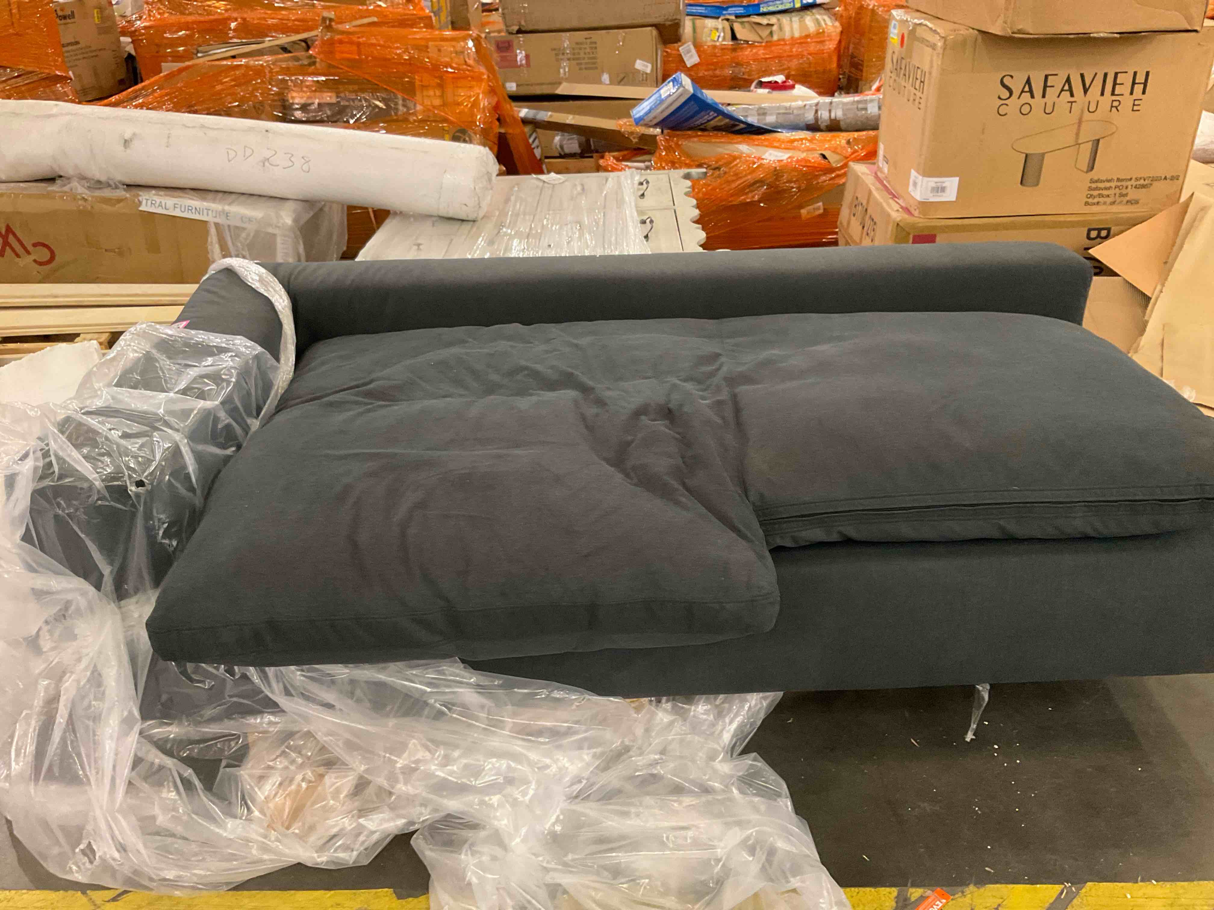 black couch (missing cushions )