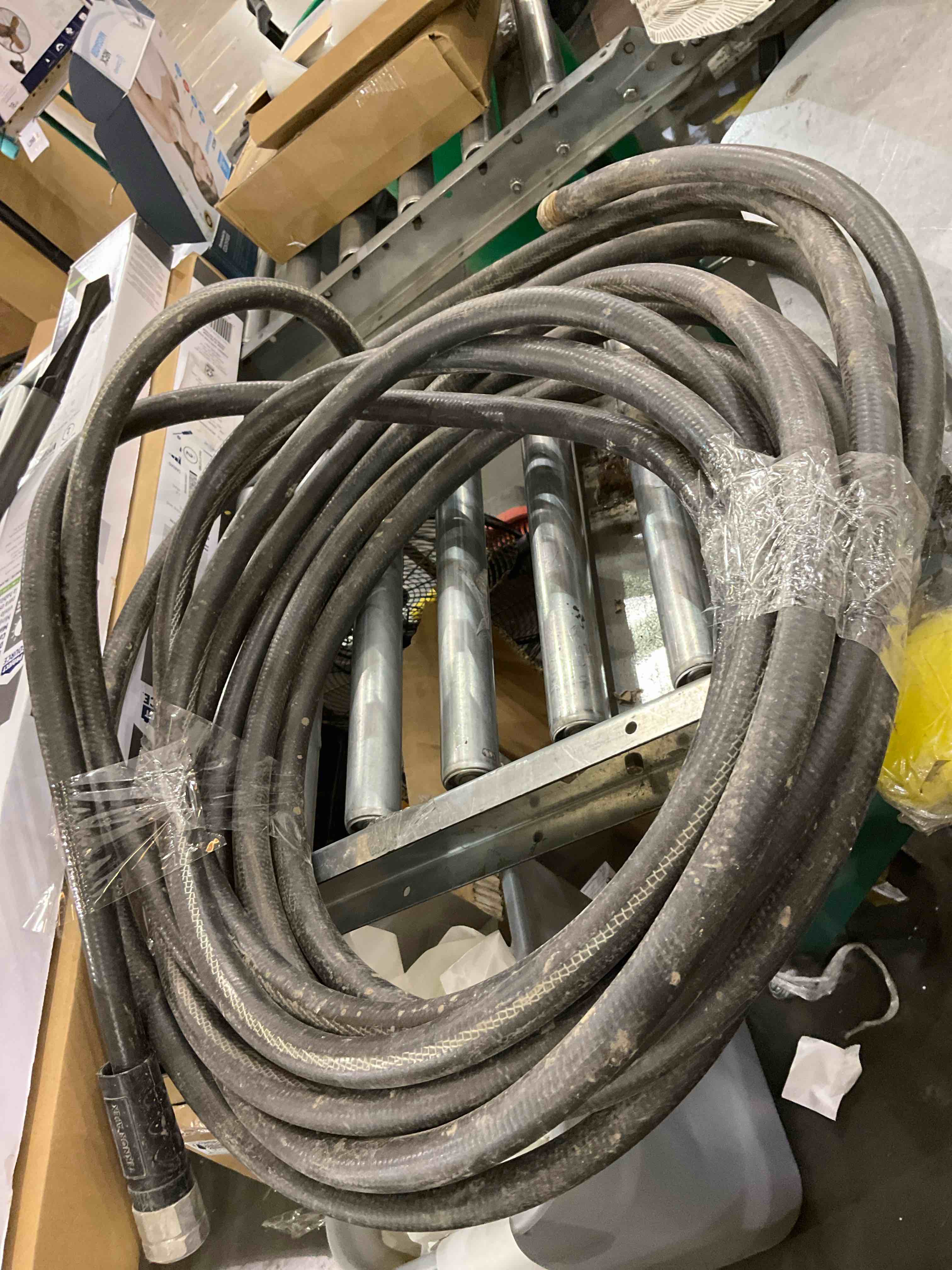 Condition photo showing As Is for black hose pipe 