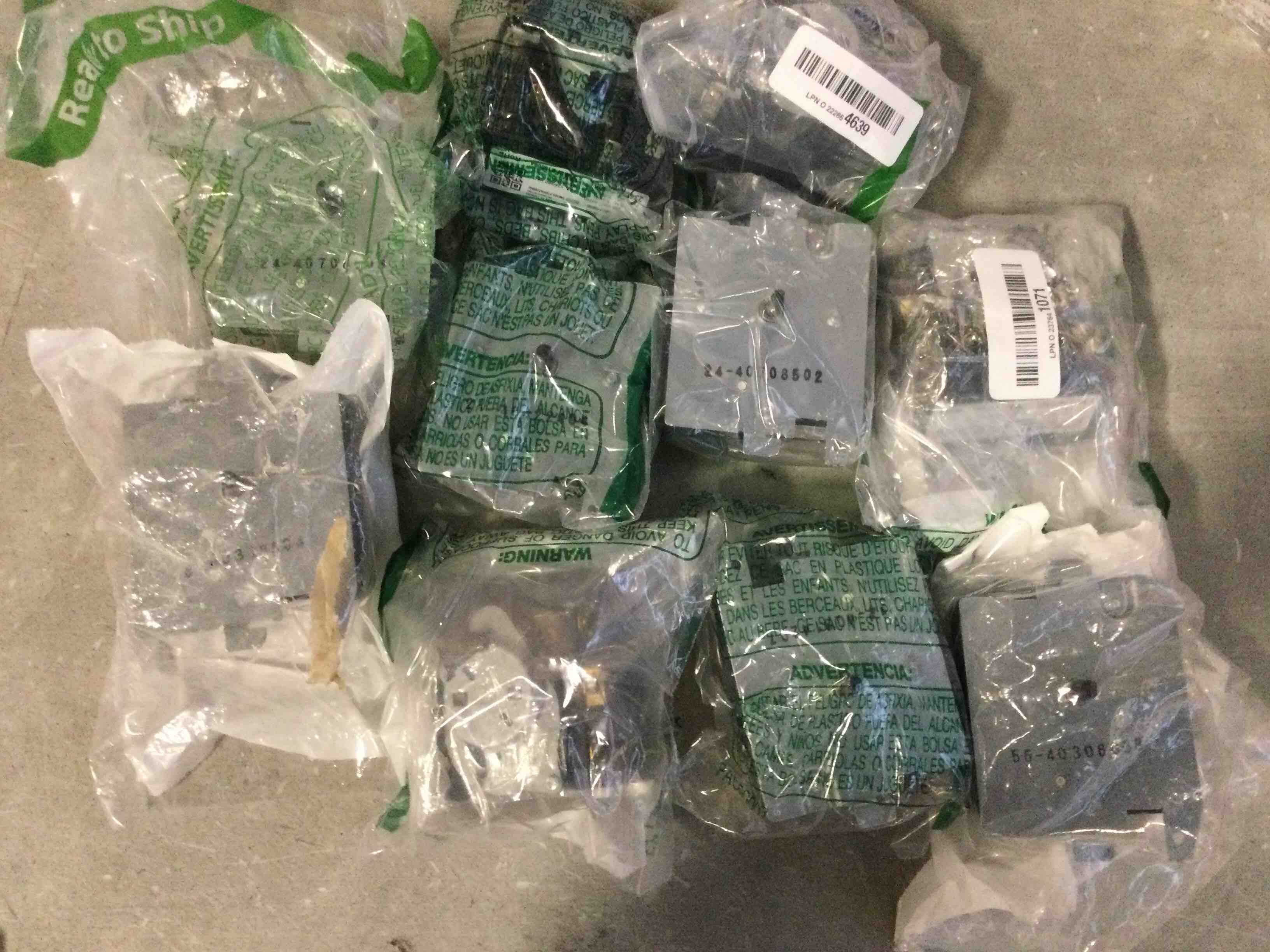 Assortment of loose electronics headphones etc.