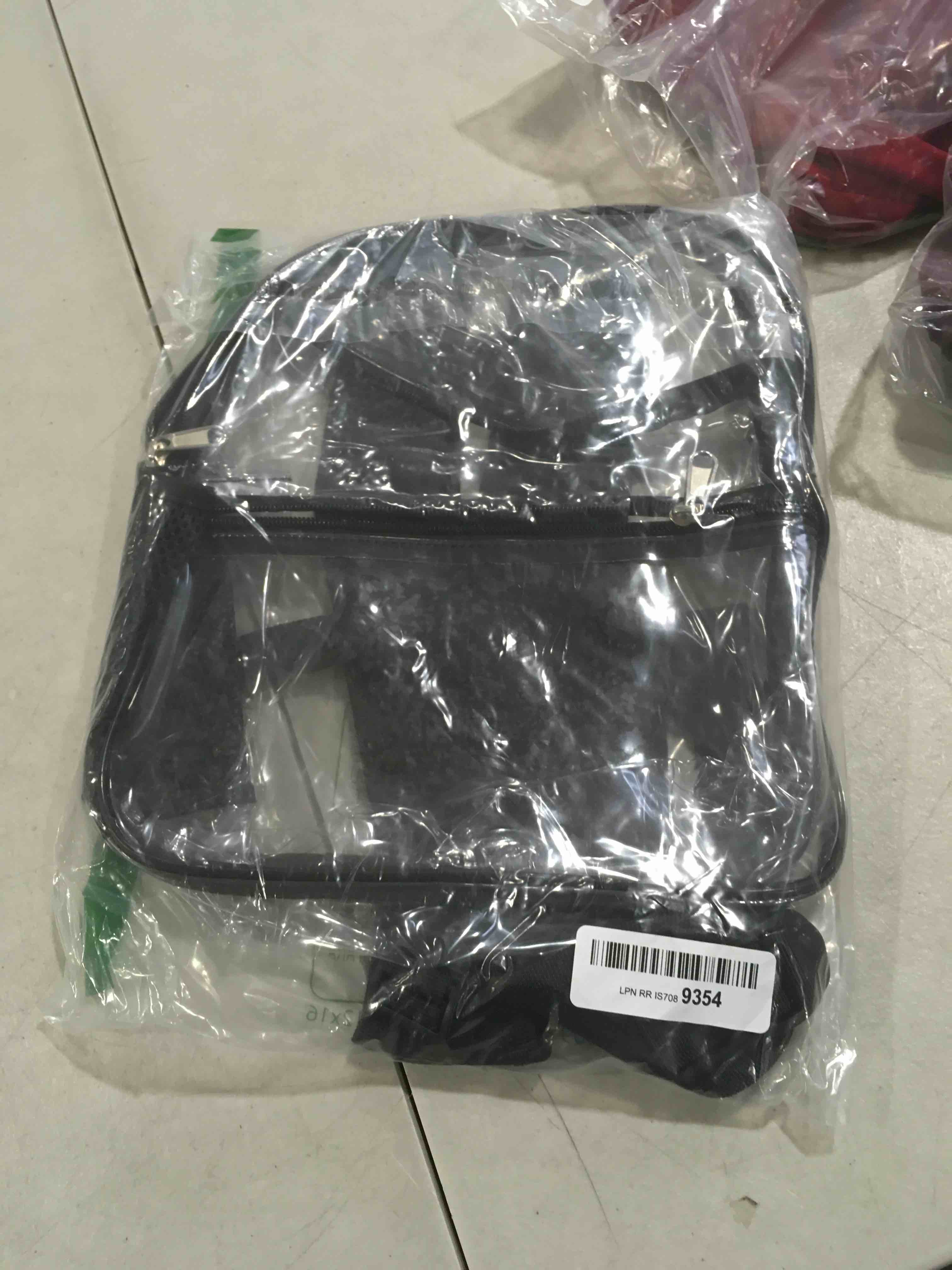 Amazon Basics Transparent School Backpack, With Water-Resistant PVC Plastic Material and Ruggedly Ruinforced Shoulder Straps, Clear