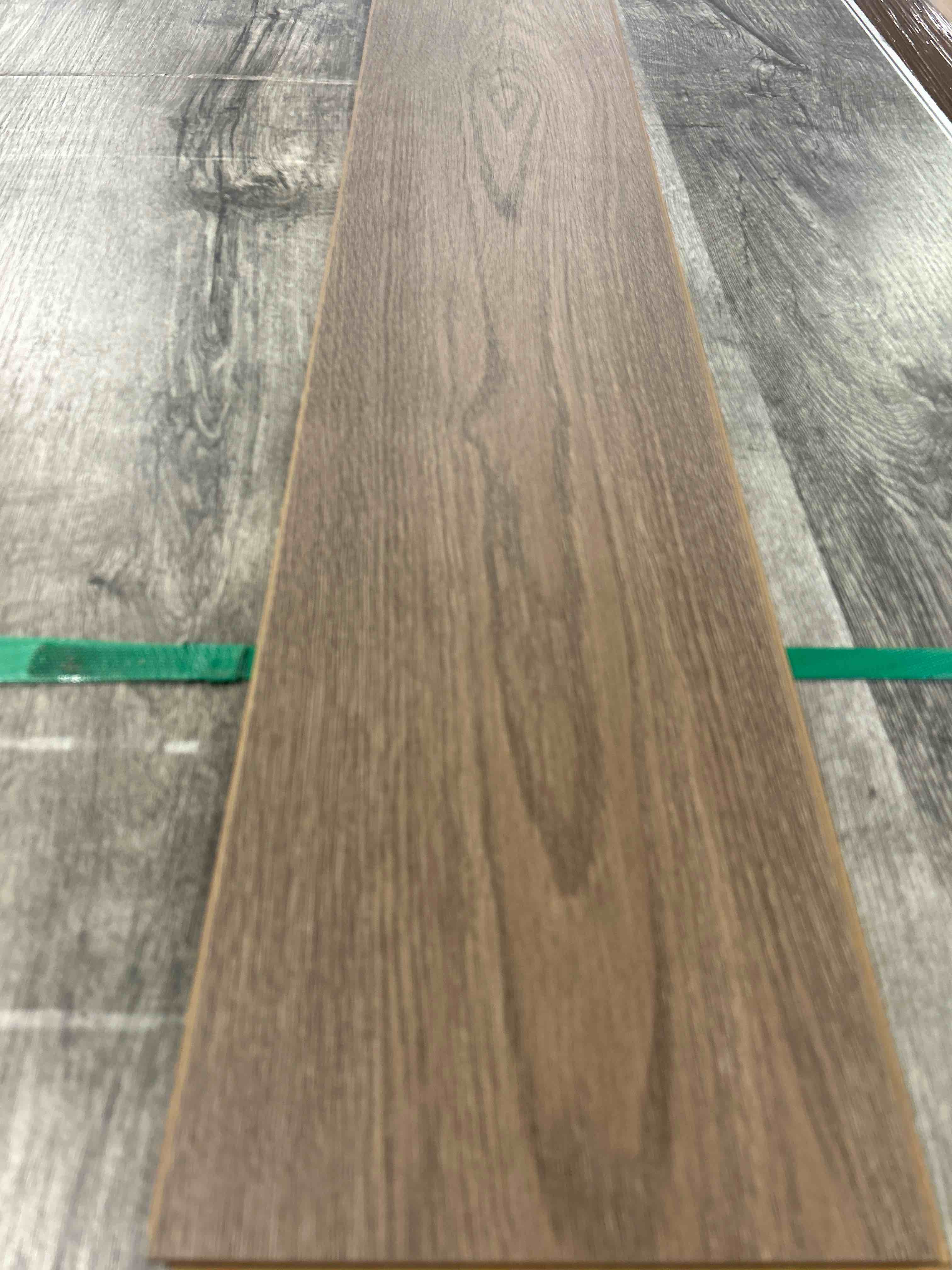 Laminate Wood Flooring (25.5 sq ft/ Box) 56 Boxes = 1428 Sq Ft Bid per sq ft 
