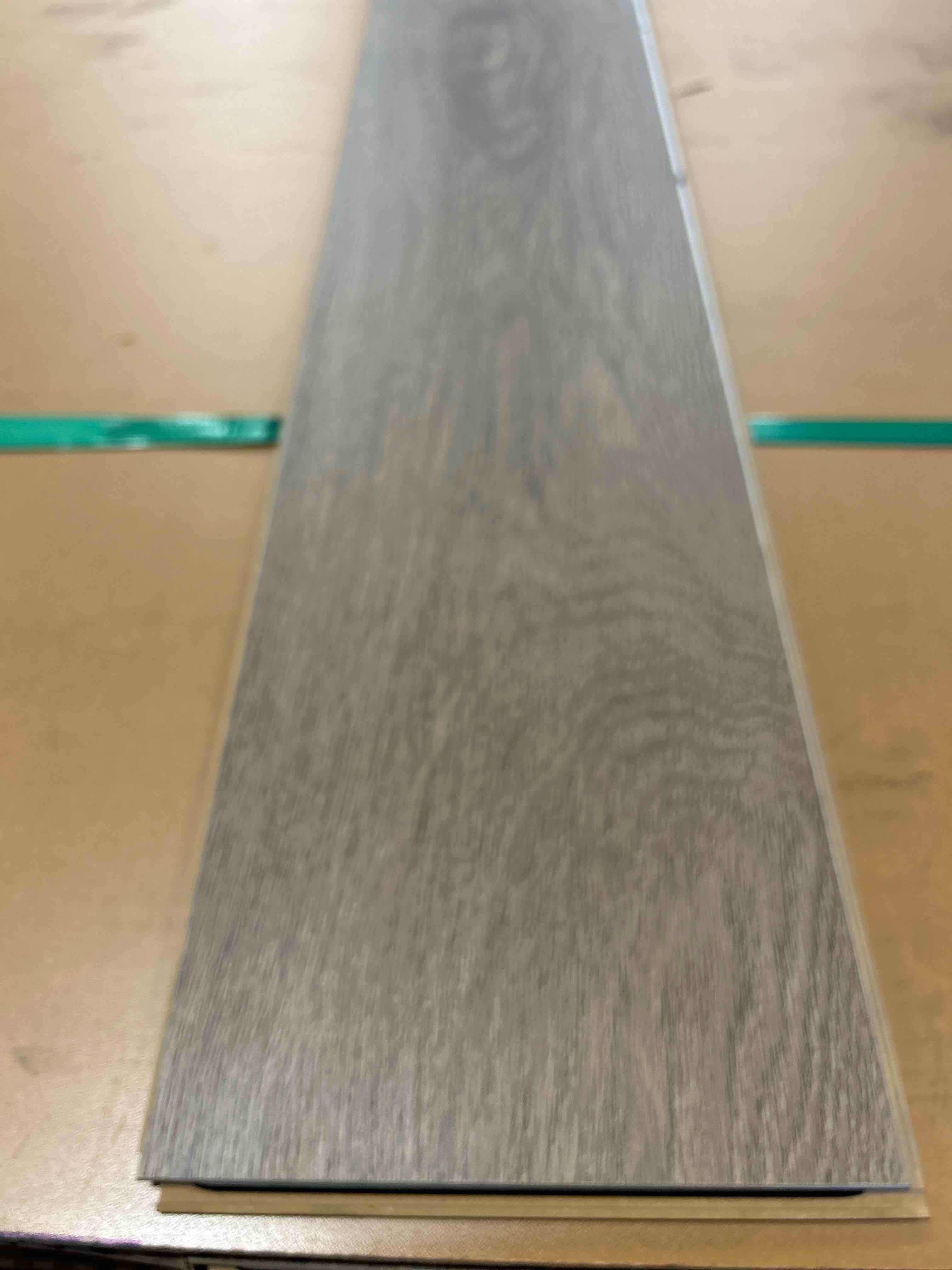 Laminate Wood Flooring (25.5 sq ft/ Box) 56 Boxes = 1428Sq Ft Bid per sq ft 
