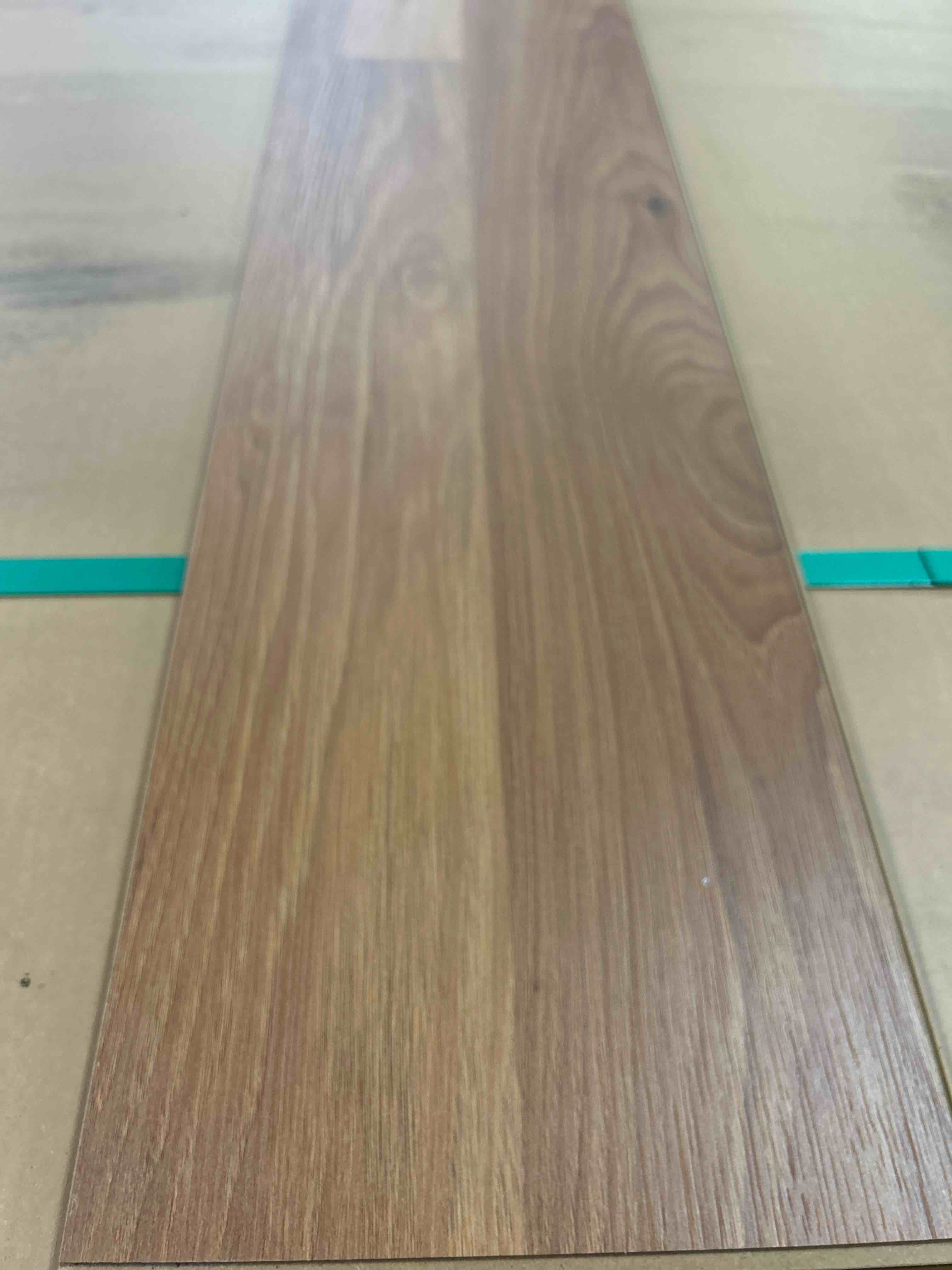 Laminate Wood Flooring (25.5 sq ft/ Box) 56 Boxes = 1428 Sq Ft Bid per sq ft 