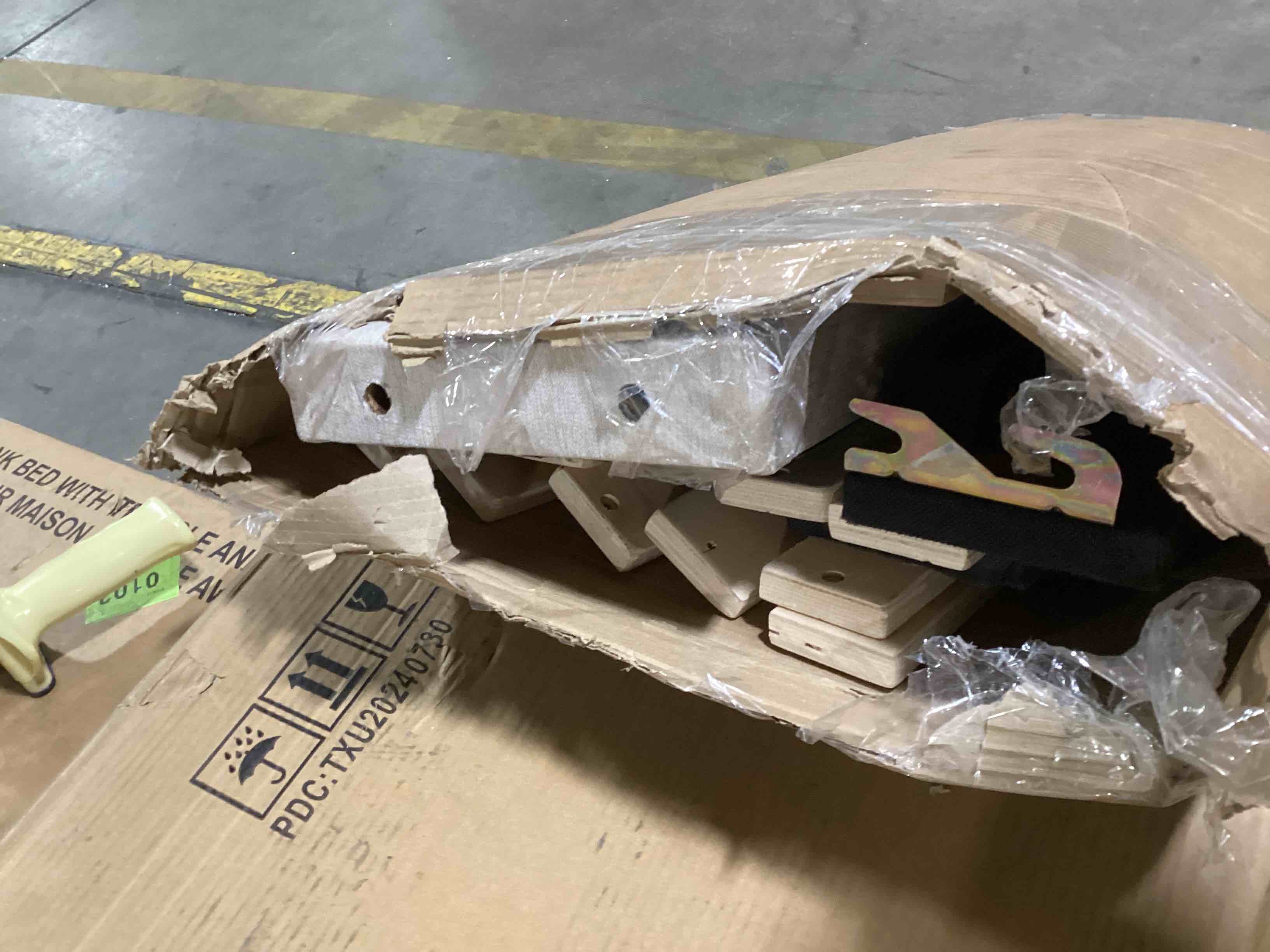 Twin bed frame with beige headboard (incomplete) (similar to stock photo)