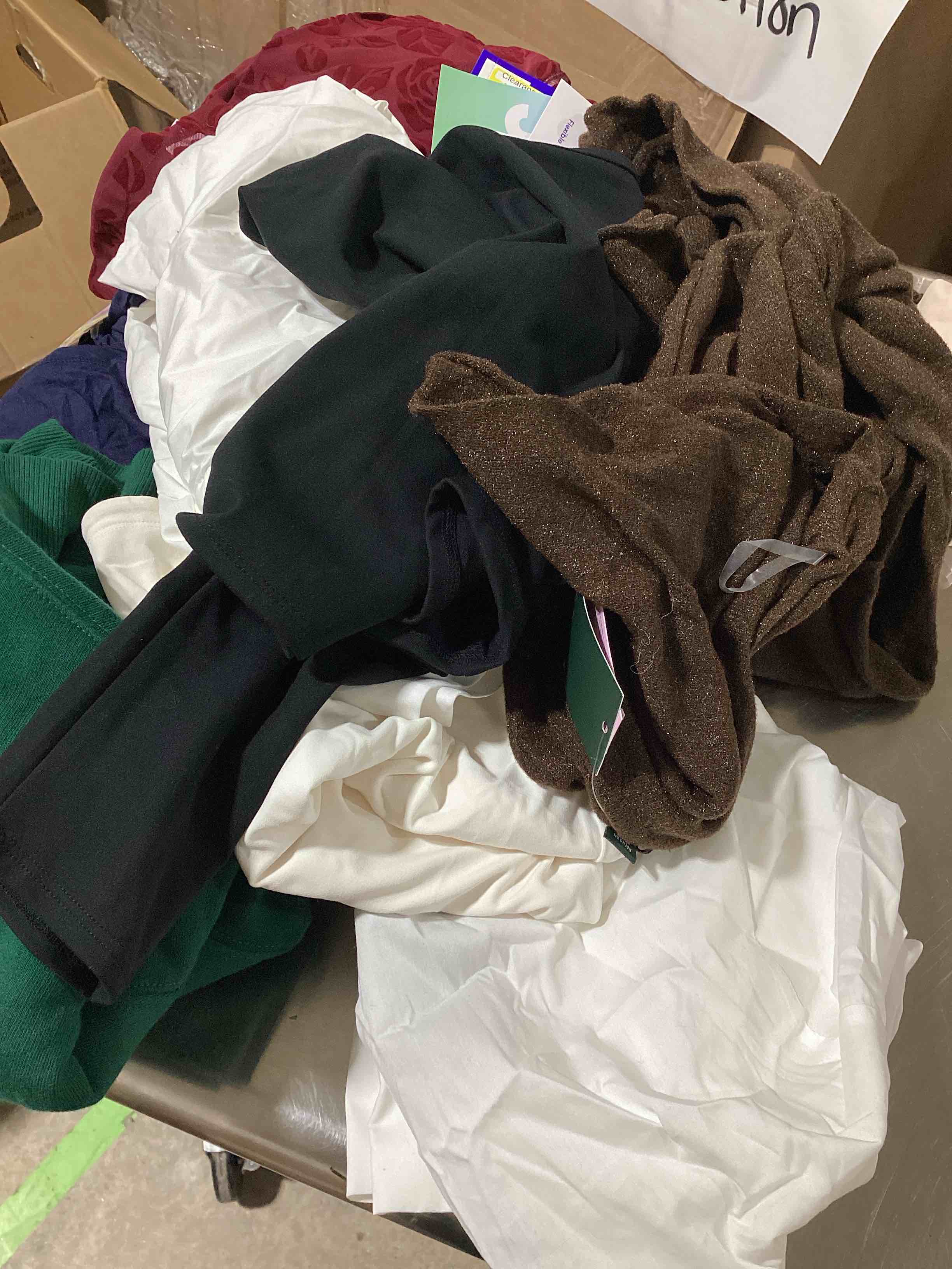 assorted new clothing different sizes & styles