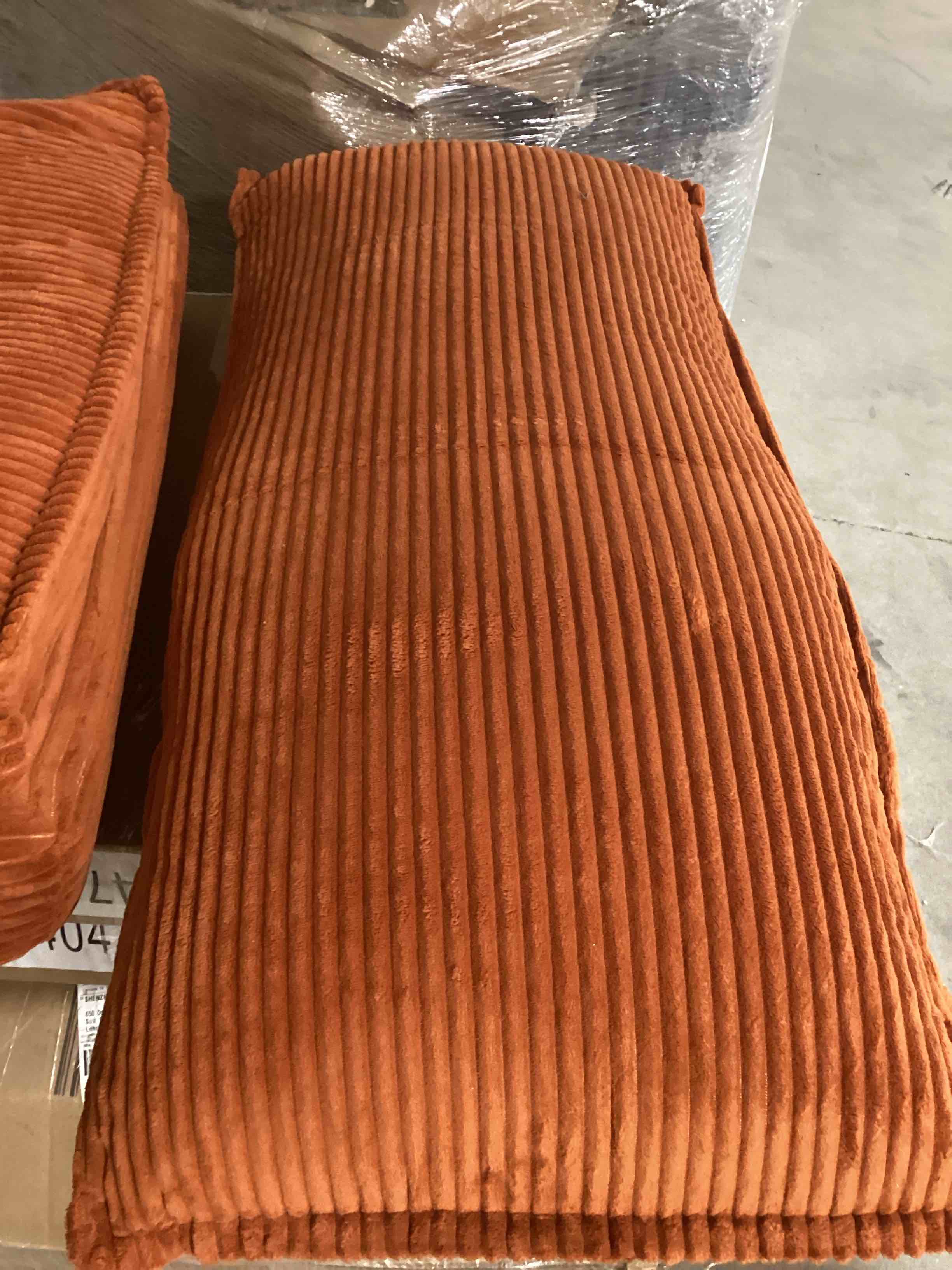 Orange sofa cushion