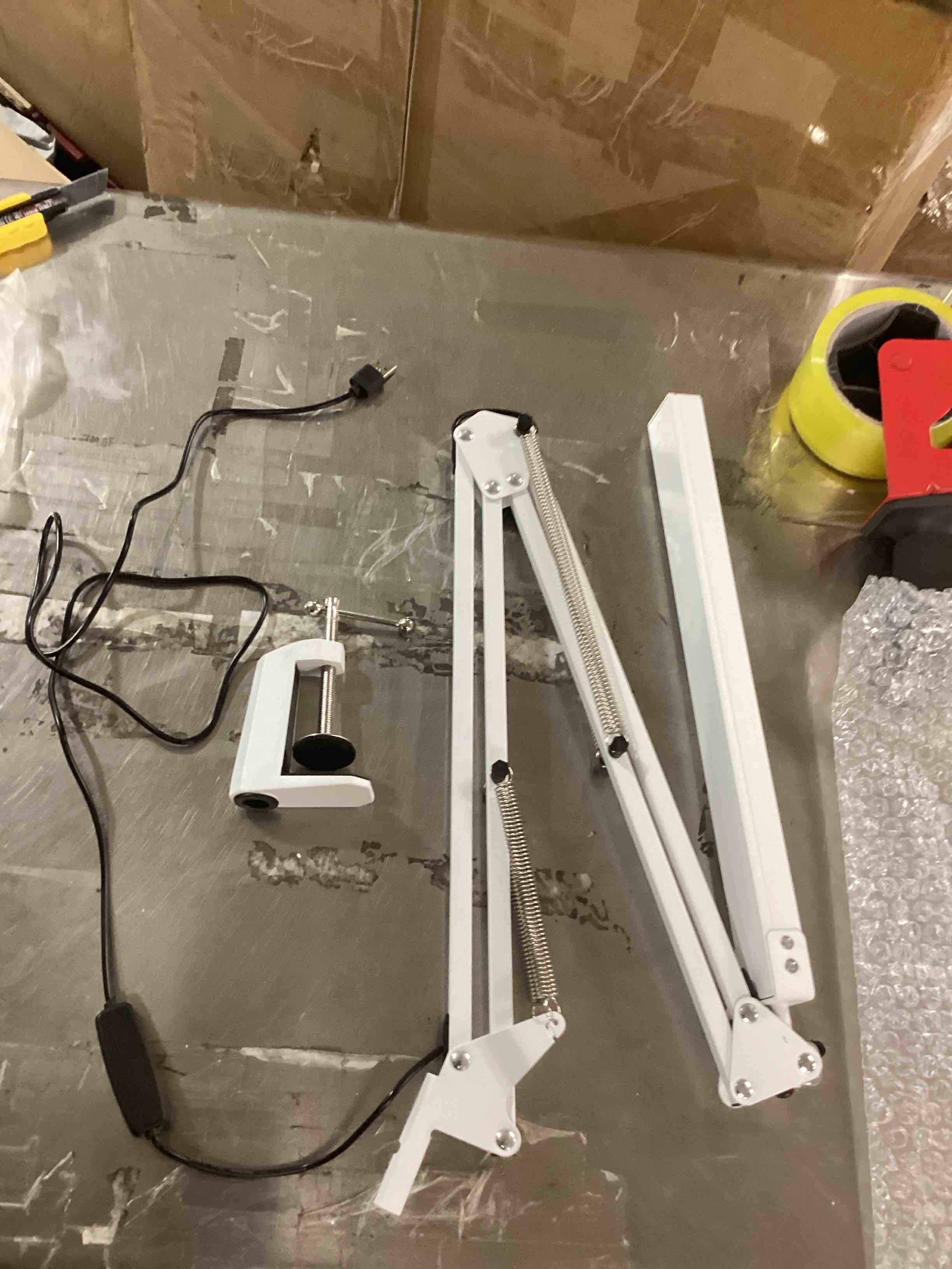 Desk lamp with a clamp