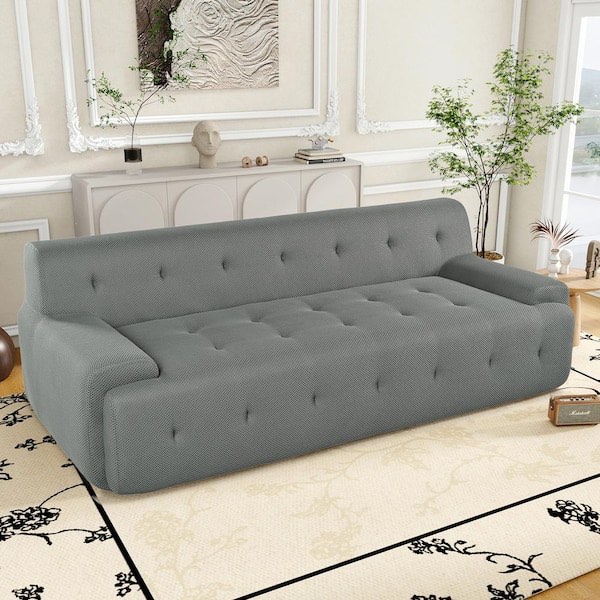 gray cushion sofa