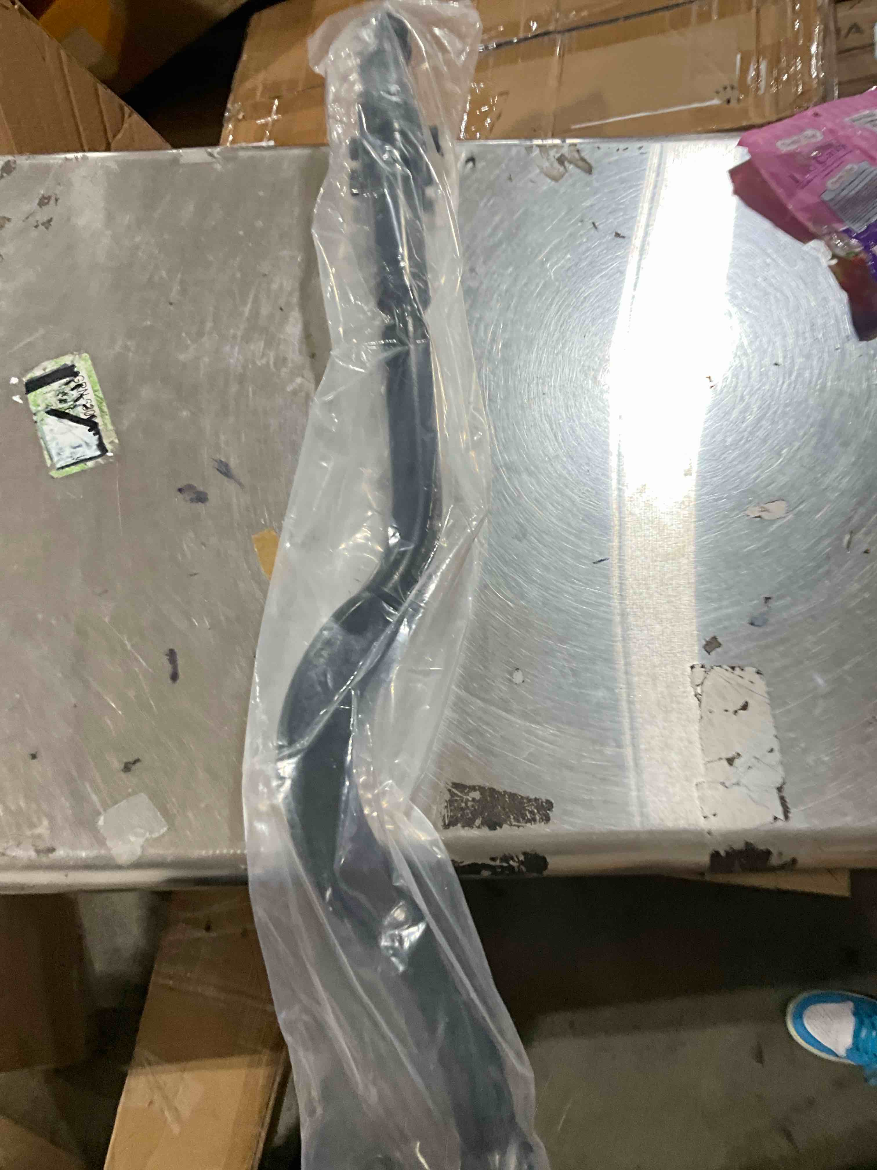 spare car, part unknown, possibly as a suspension bar