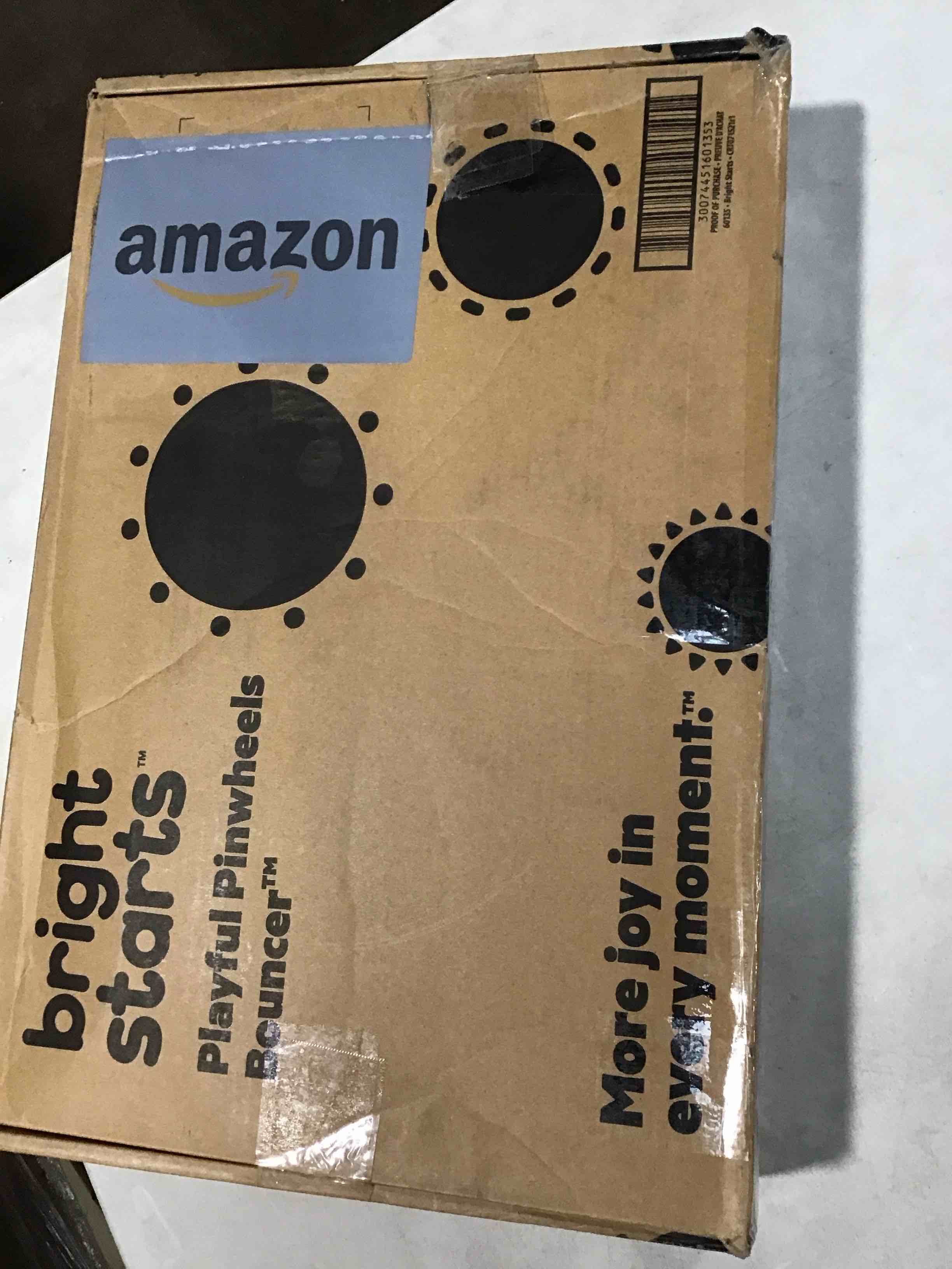 bright starts playful pinwheels bouncer