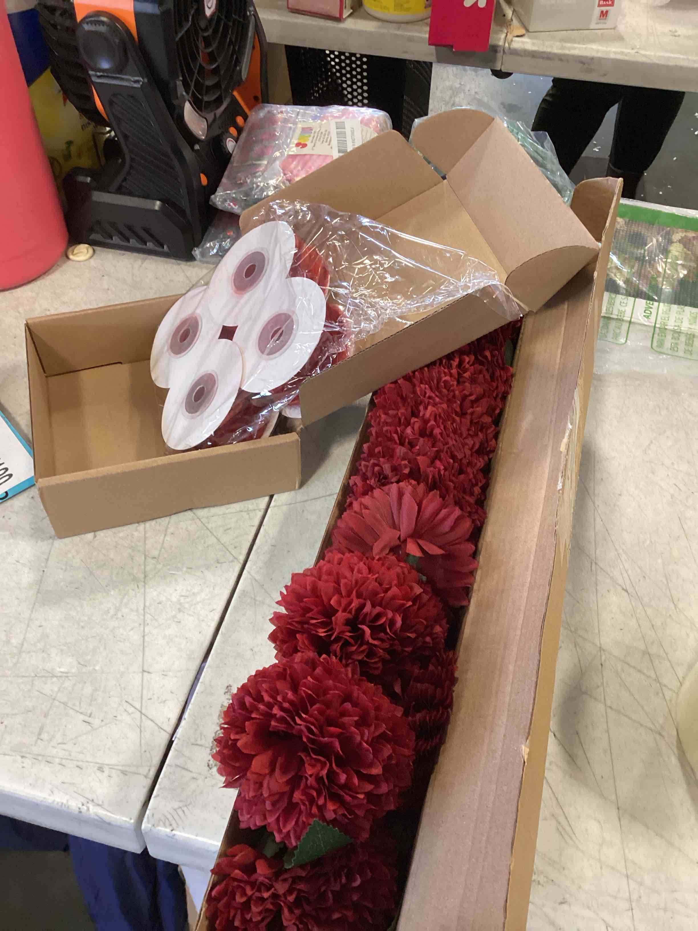 RED RIBBON AND RED FAUX FLOWERS 