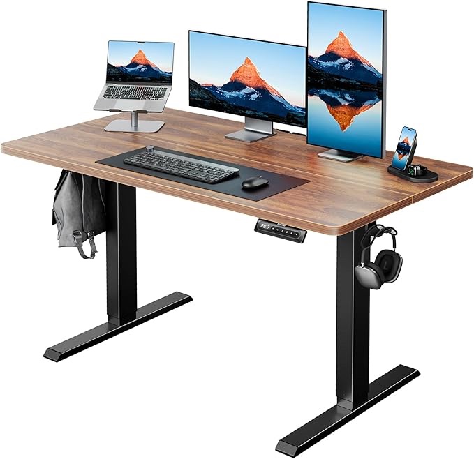 HUANUO 48" x 24" Electric Standing Desk Adjustable Height, 4 Memory Height Settings, Headphone Hook, Cable Manager, Sit Stand Up Desk for Home Office & Computer Workstation, Walnut