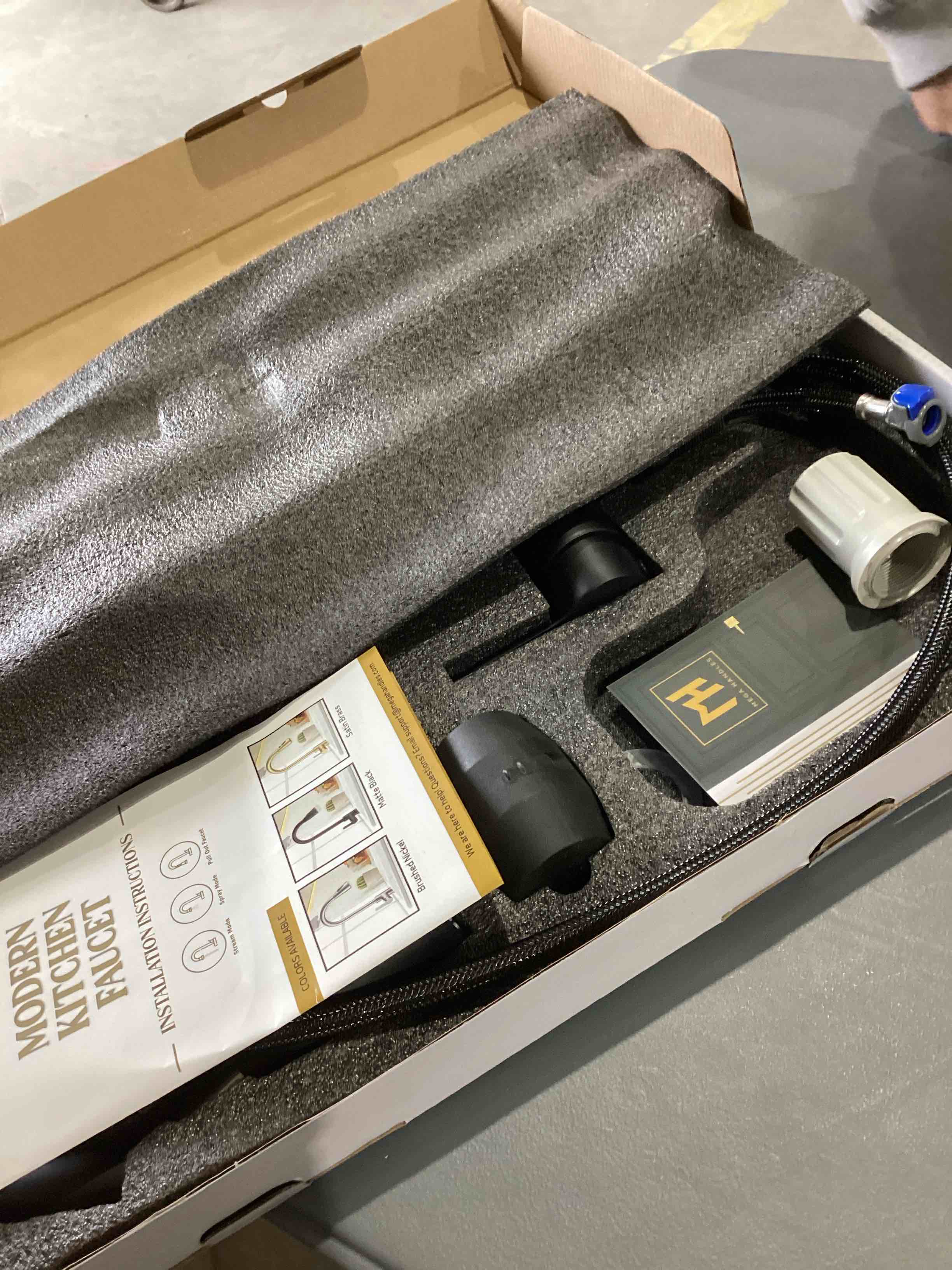 Condition photo showing As Is for pull down modern kitchen sink faucet black 