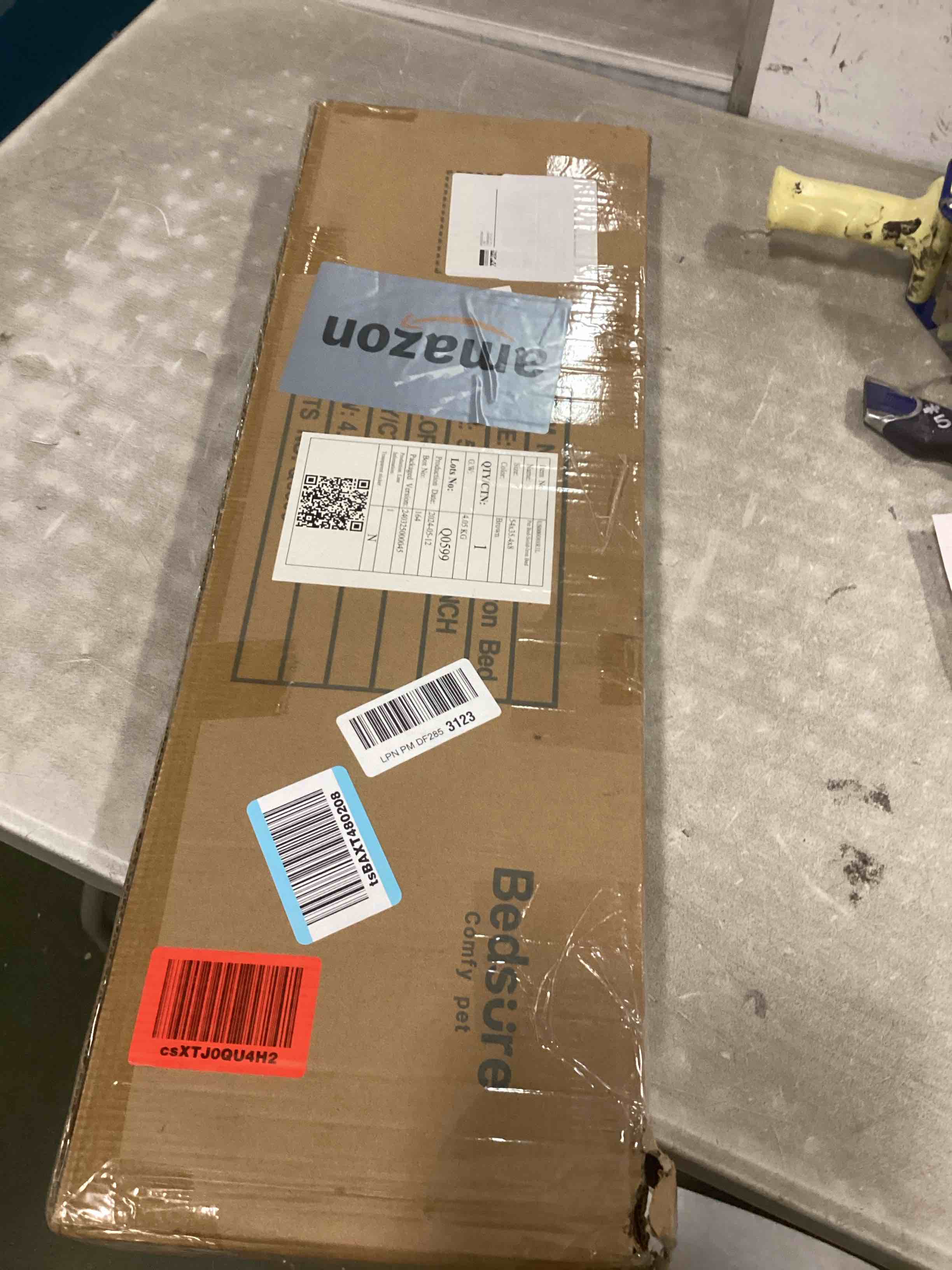 Condition photo showing Good Condition for Bedsure XL Elevated Outdoor Dog Bed - Raised Dog Cots Beds for Extra Large Dogs, Portable Indoor & Outdoor Pet Hammock Bed with Skid-Resistant Feet, Frame with Breathable Mesh, Brown 54.0"L x 35.4"W x 8.0"Th Brown