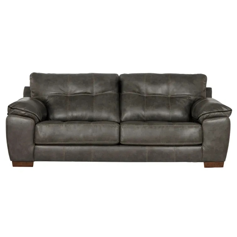 Peosta 97” Pillow Top Arm Sofa it’s Reversible Cushions