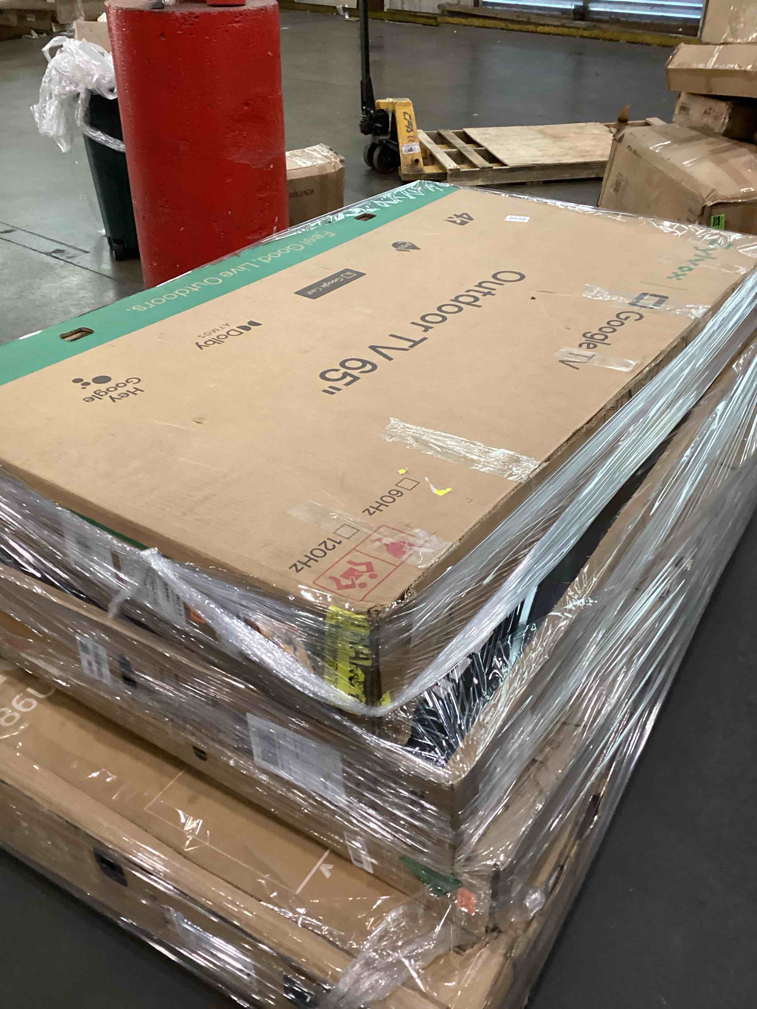 pallet of broken tv’s