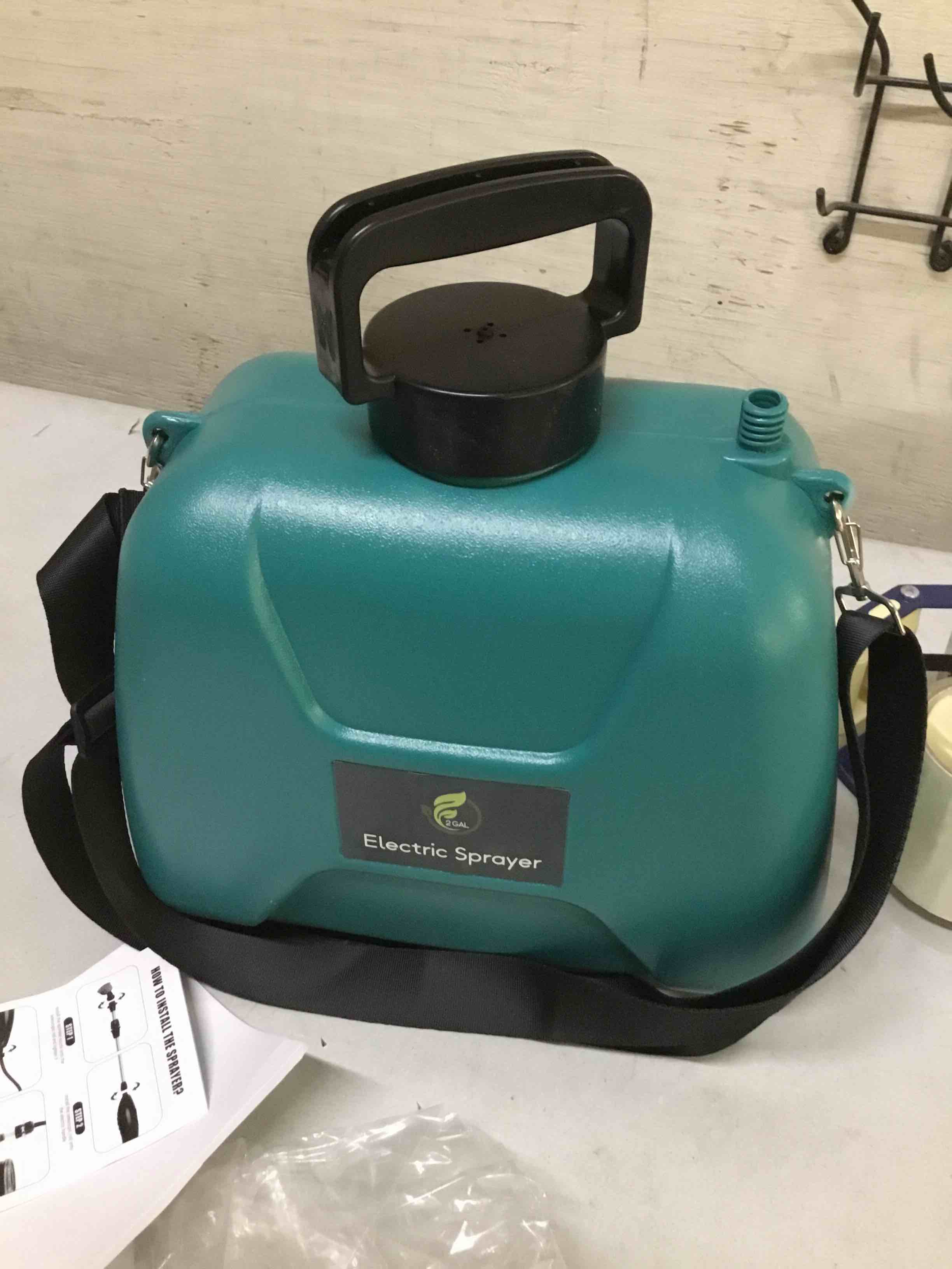 Condition photo showing As Is for ( incomplete) 2 gallon battery powered garden sprayer, electric sprayer with usb rechargeable handle, 3 mist nozzles, retractable wand, water pump sprayers with adjustable shoulder strap for yard, lawn and garden