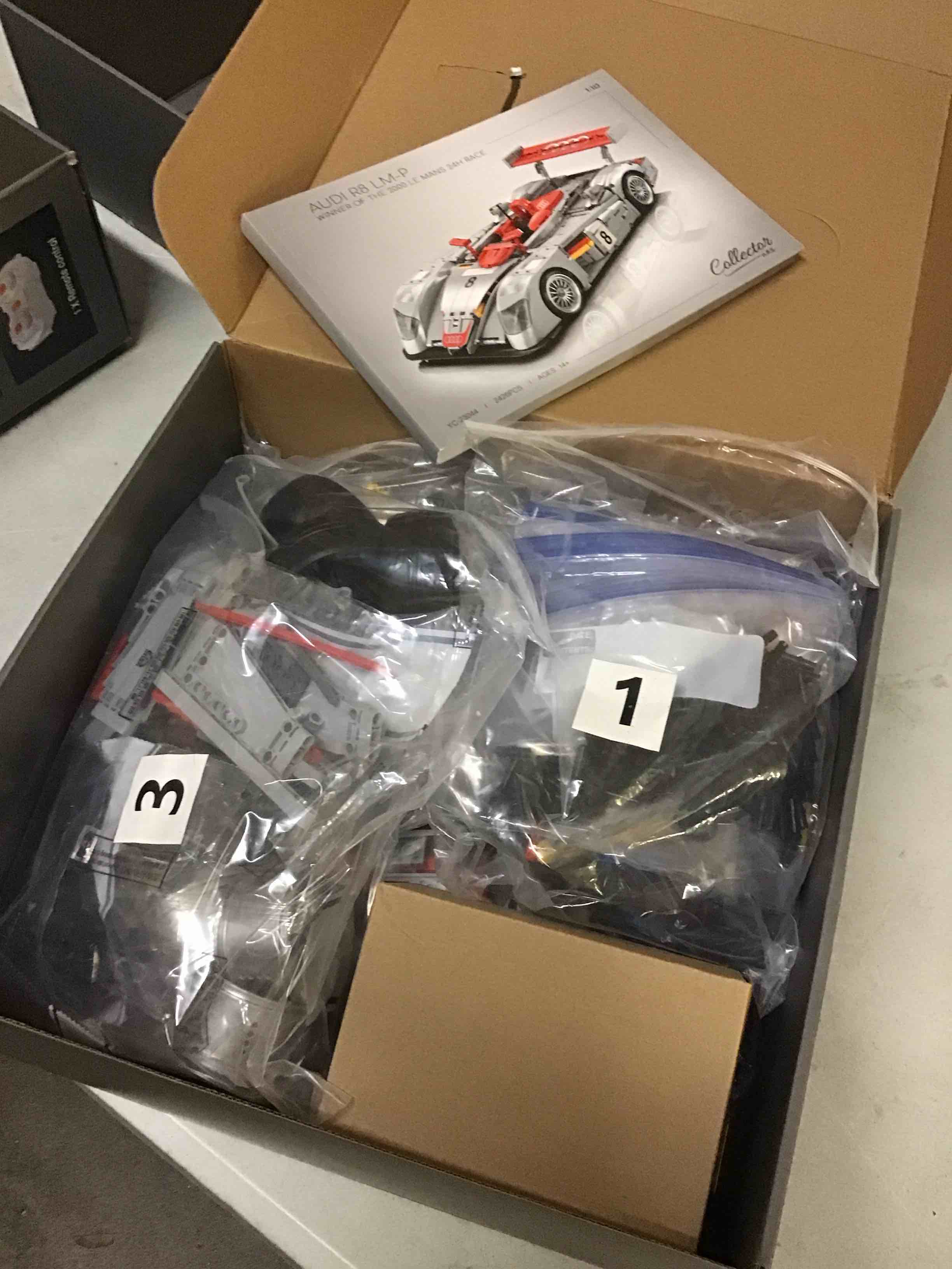 Condition photo showing As Is for mocburiku audi r8 lm-p 24h le mans winner, collectible race car building kit for adults teens, 1:10 scale racing techinc car model, home or office décor gift for motorsport fans age 14+ (2,426 pcs)