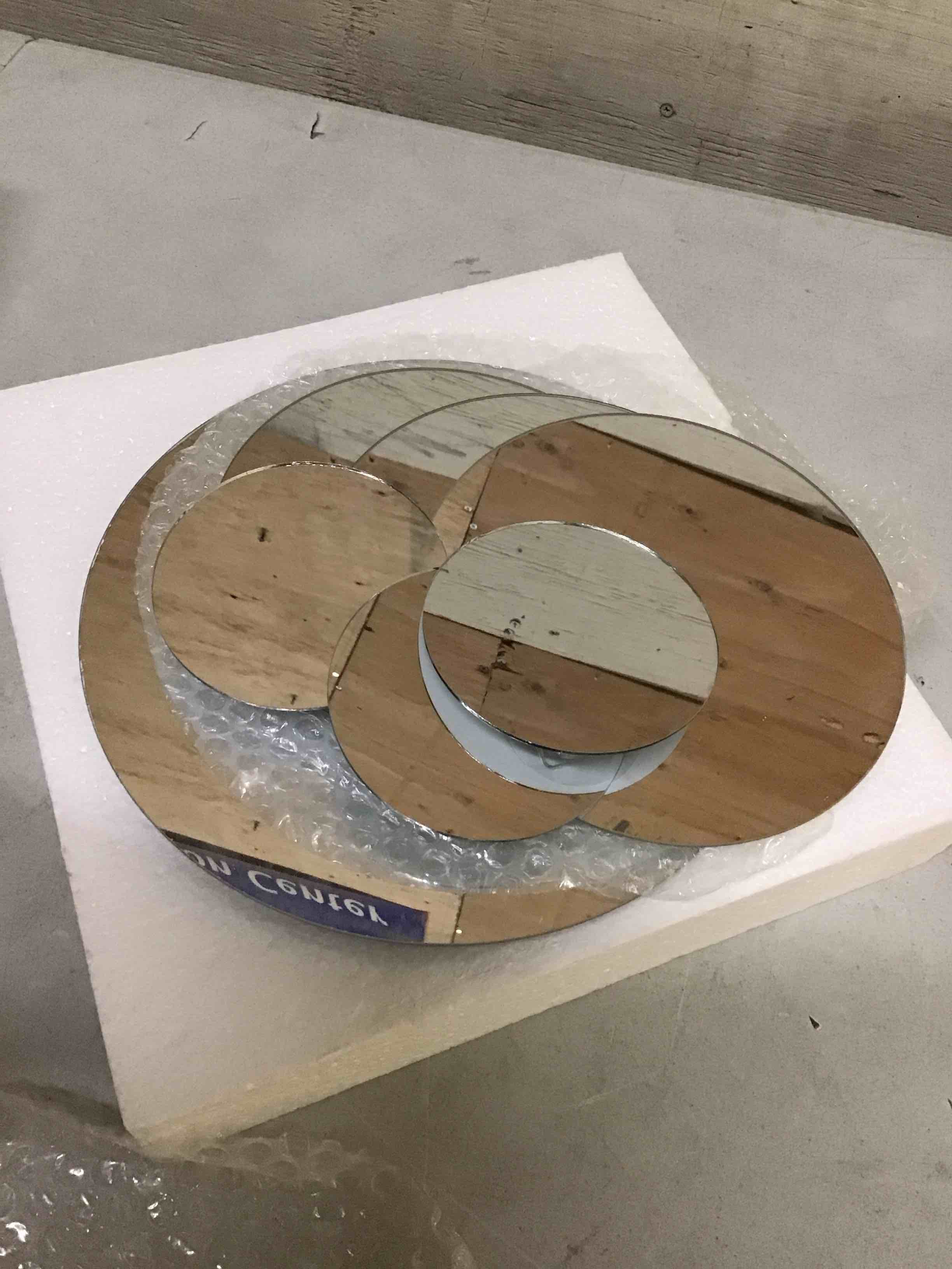 Condition photo showing As Is for round wall-mount mirror, set of 7, assorted sizes 4 inch. 7. inches 10 inches