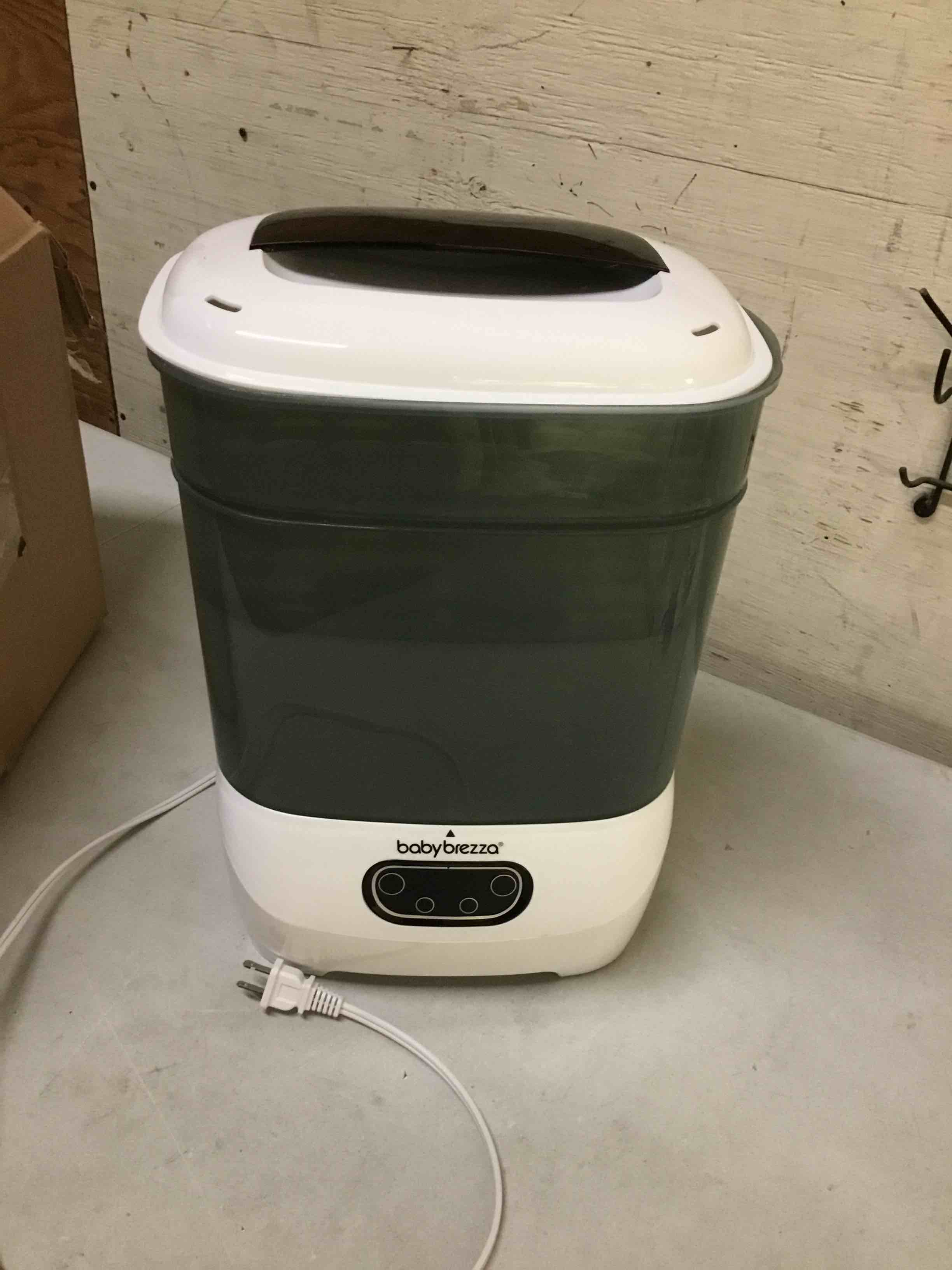 Condition photo showing As Is for baby brezza bottle sterilizer and dryer advanced – 33% faster - largest capacity steam sanitizer - universal sterilization machine for all bottles + pump parts - hepa air filter white