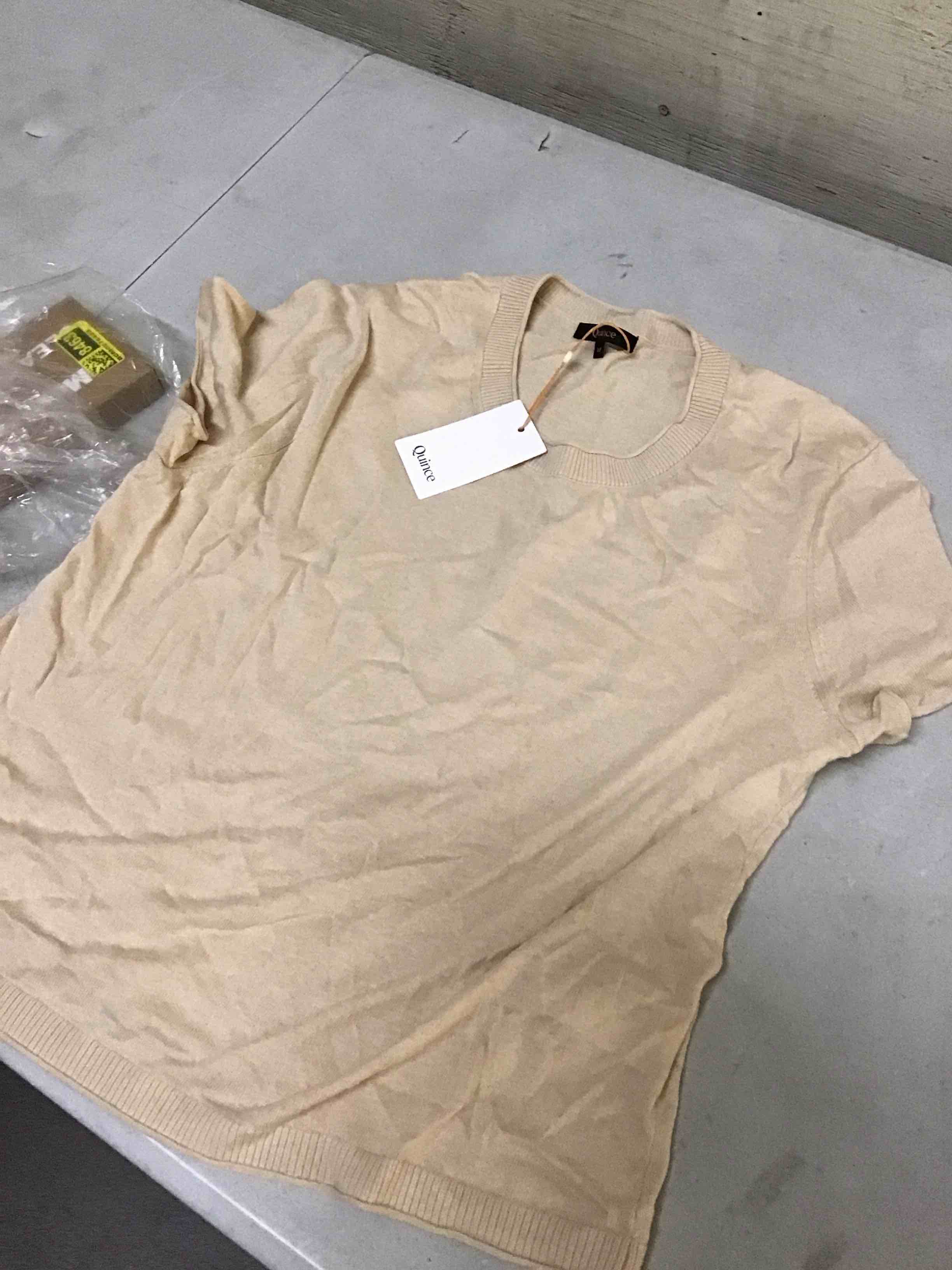 Size medium Quince Short Sleeved Light khaki color