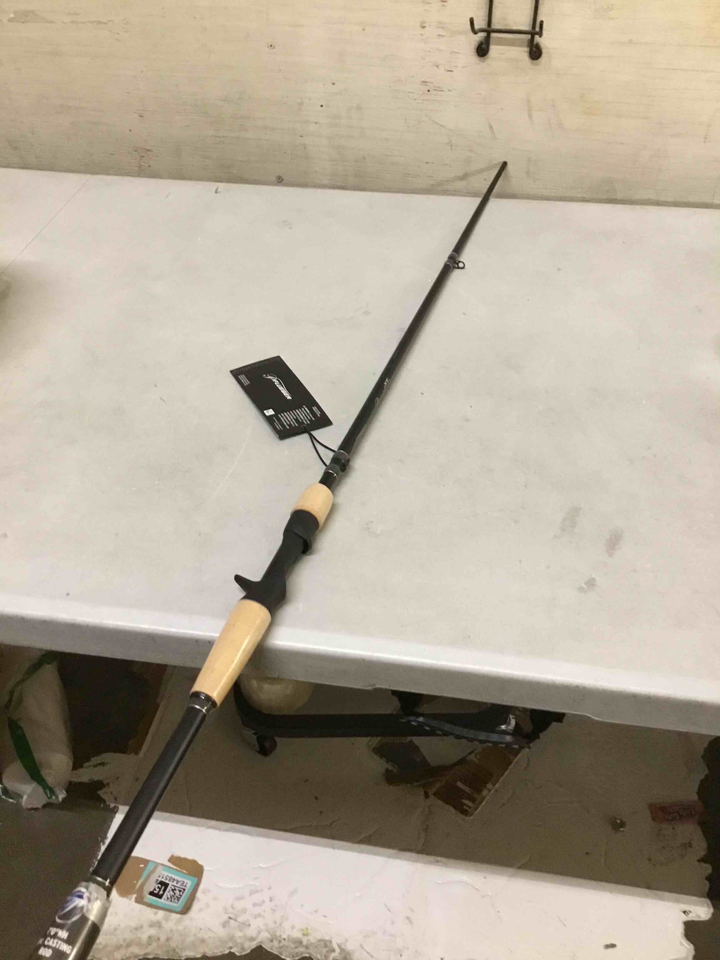 Condition photo showing As Is for ( incomplete) pflueger president xt casting rod 7' - medium heavy - 2pc