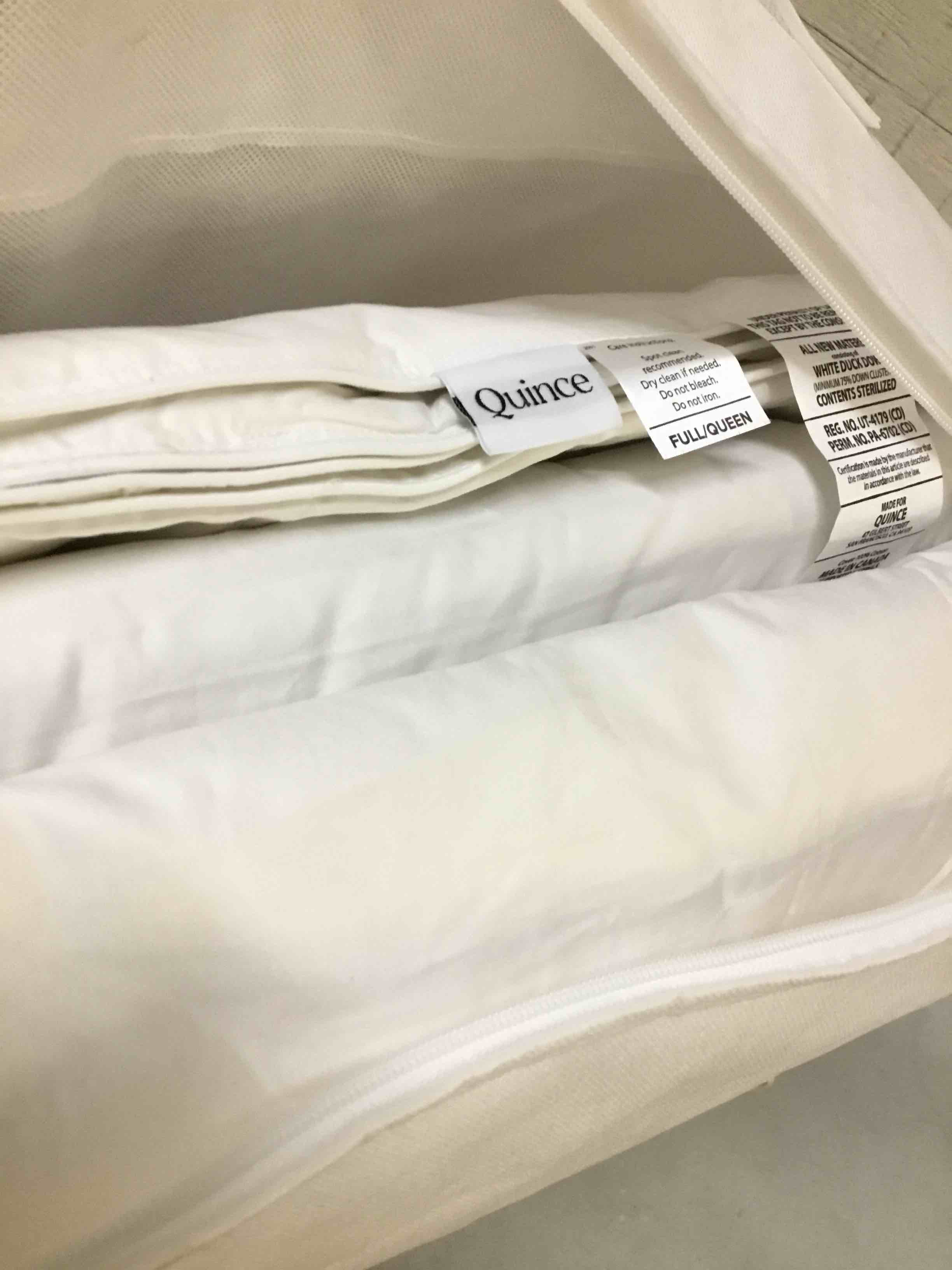 Condition photo showing As Is for quince premium down comforter full/queen lightweight 