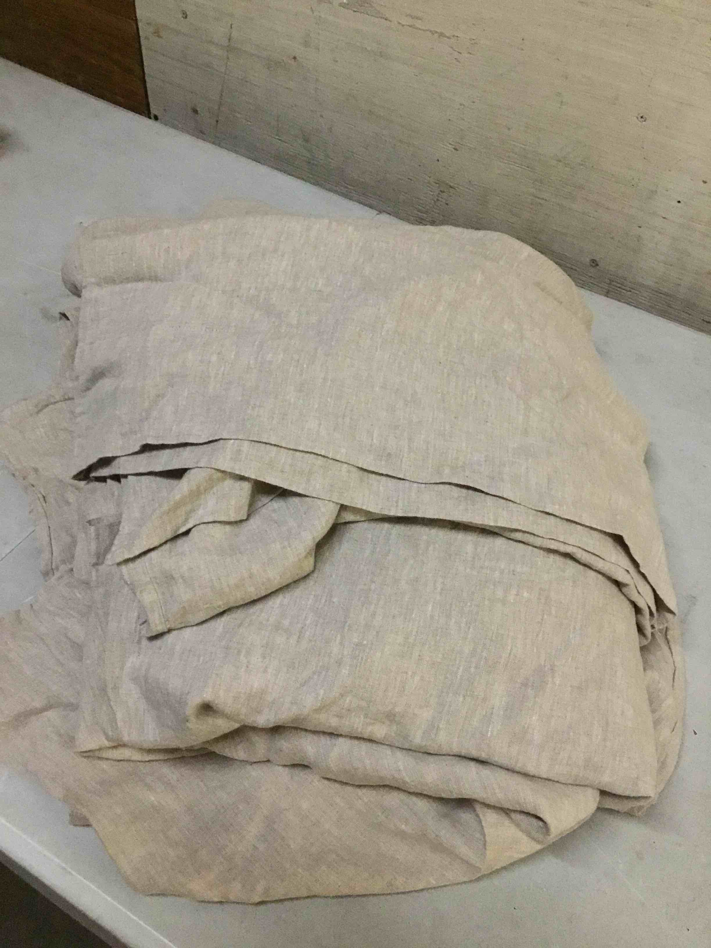 Condition photo showing As Is for quince european linen deluxe bedding bundle, cal king, natural chambray set of 3 pieces