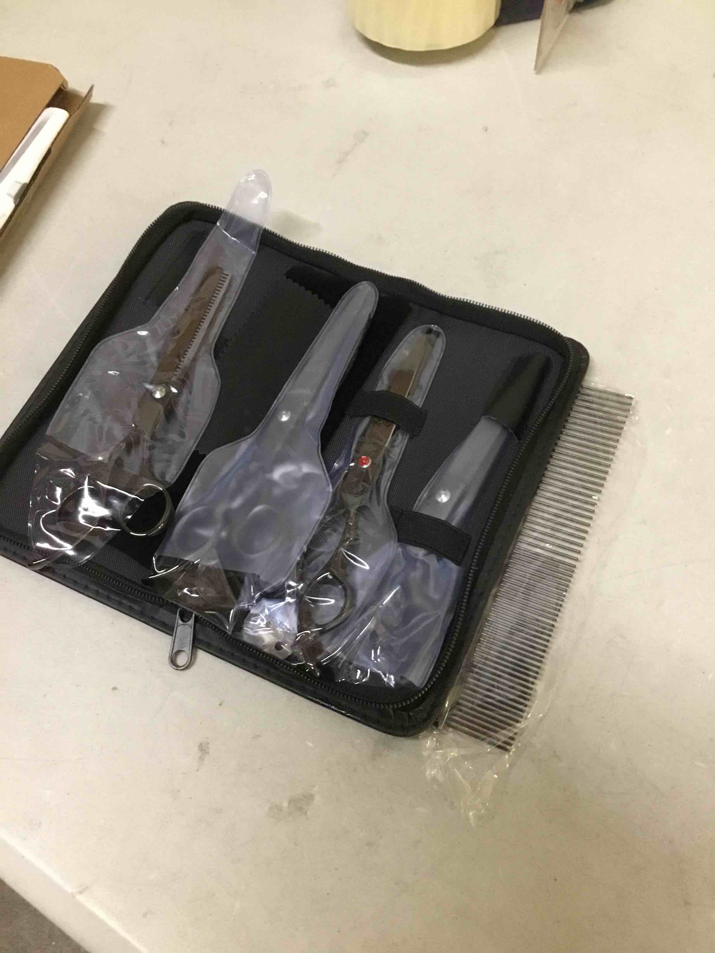 Condition photo showing Good Condition for ( with case rips ) tinmarda dog grooming kit, titanium black stainless steel dog grooming scissors with curved shears, black finger rings - 4 piece sharp durable pet shears for dogs cats at home salon-quality grooming