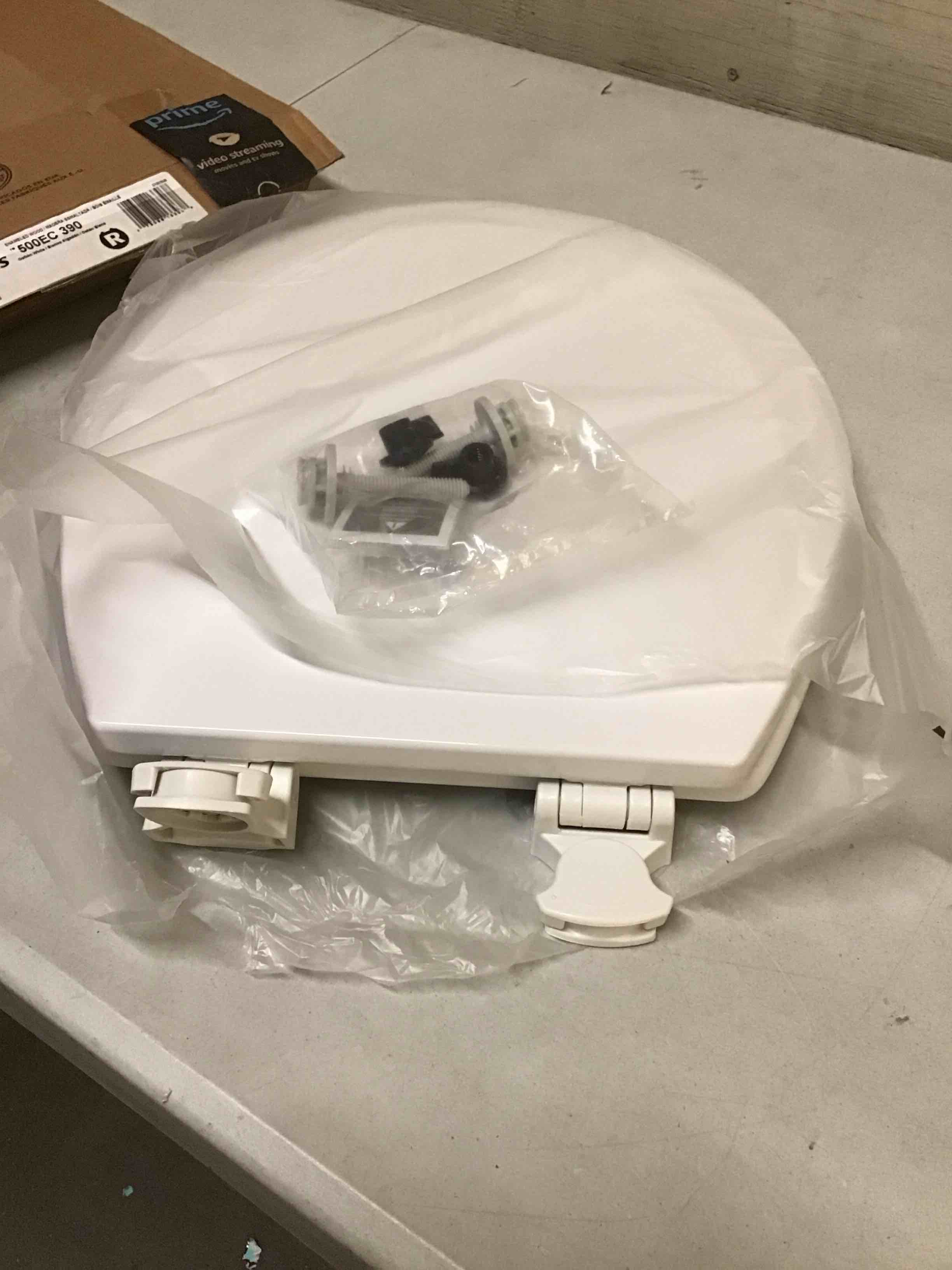 Condition photo showing New/Like New for bemis round enameled wood toilet seat in cotton white with easy•clean hinge