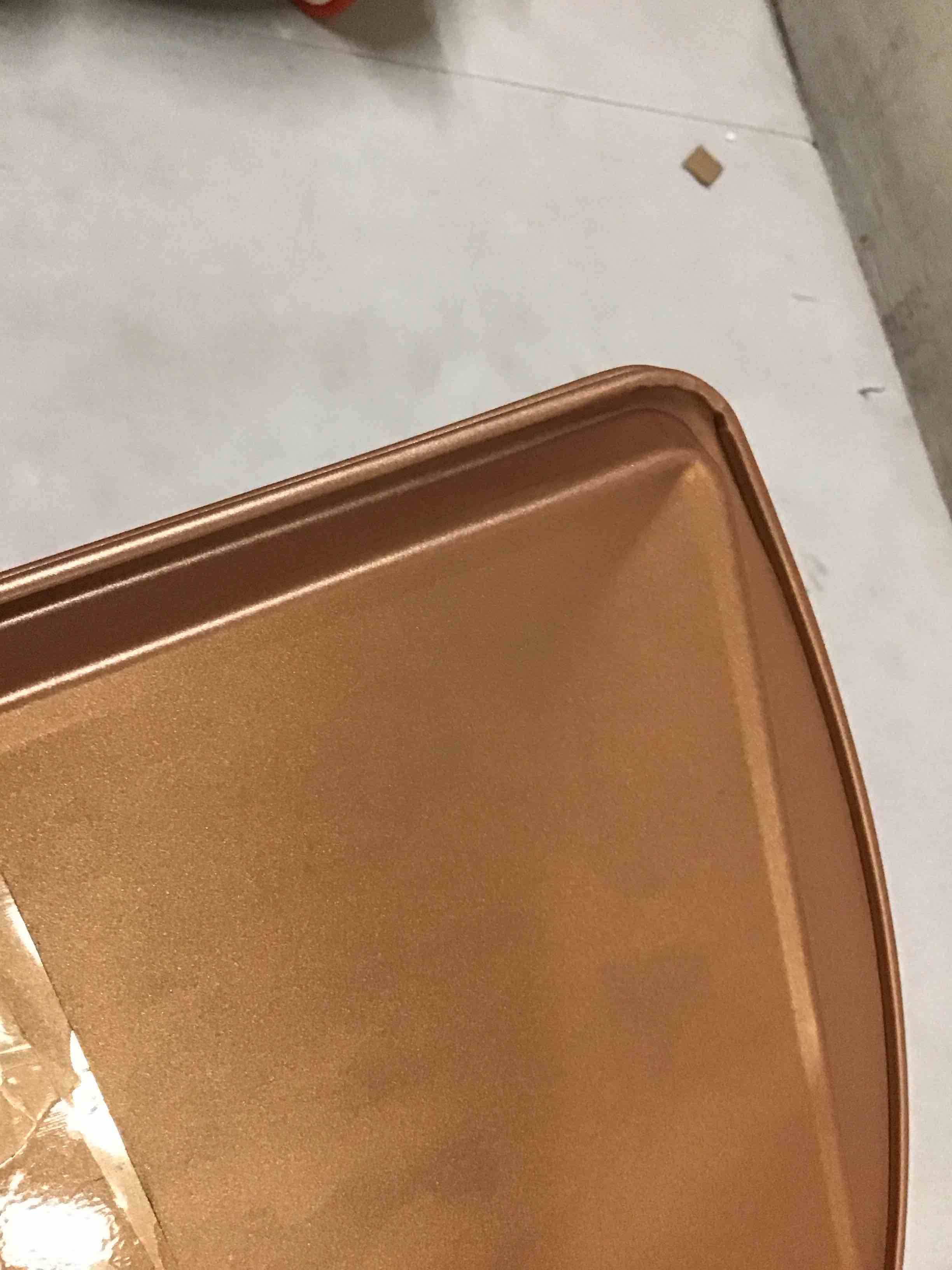 Condition photo showing As Is for ( with dent ) (set of 2) 15”x9.5” copper cookie sheets 
