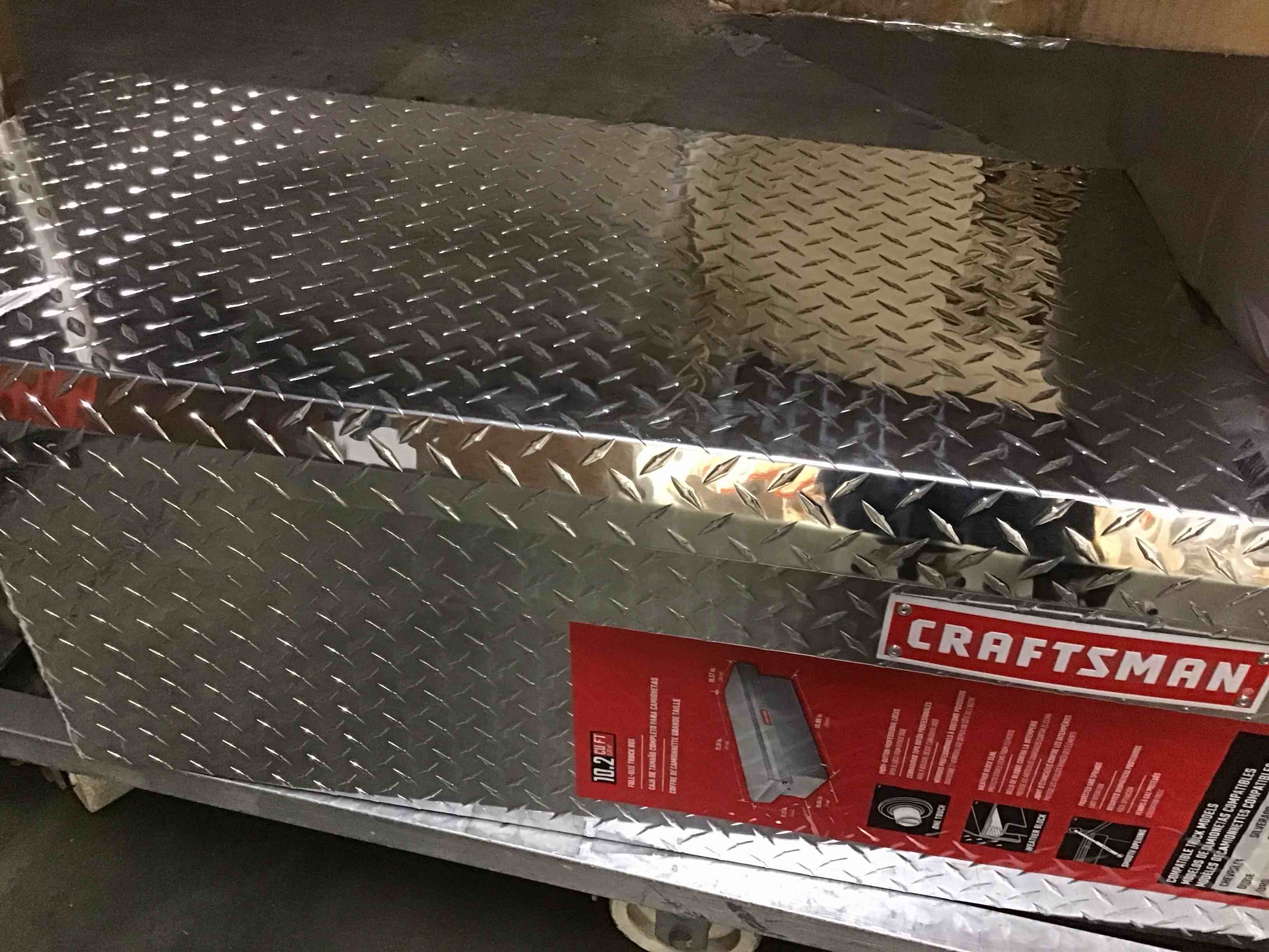 Condition photo showing As Is for ( with dent) craftsman 10.2 cu ft  full-size truck box