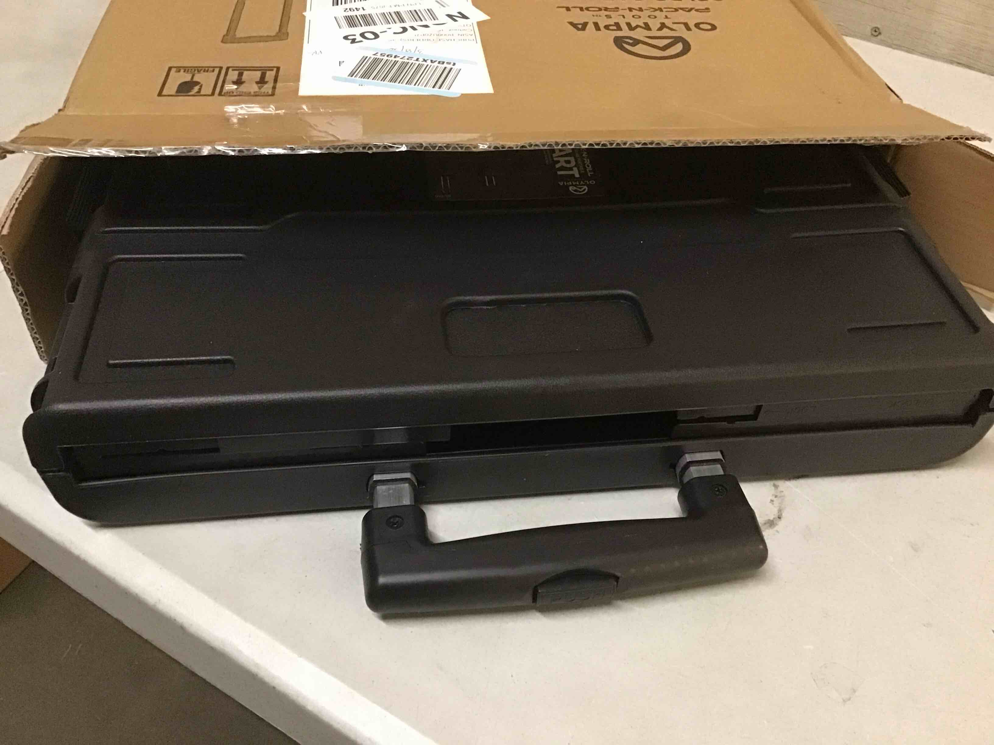 Condition photo showing As Is for (incomplete missing some parts) olympia tools 85-010 grand pack-n-roll portable tools carrier with telescopic handle, 80 lb. load capacity, black