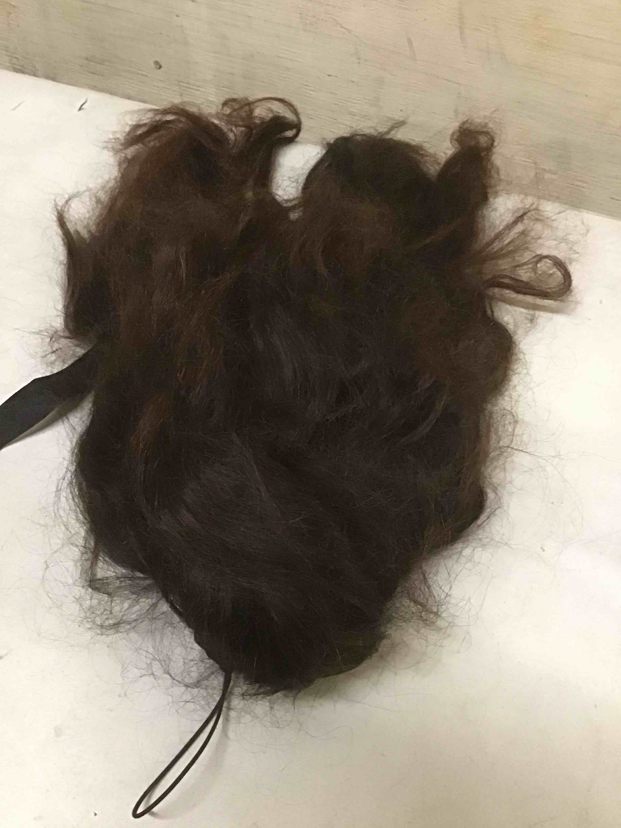 Condition photo showing As Is for  wig human hair