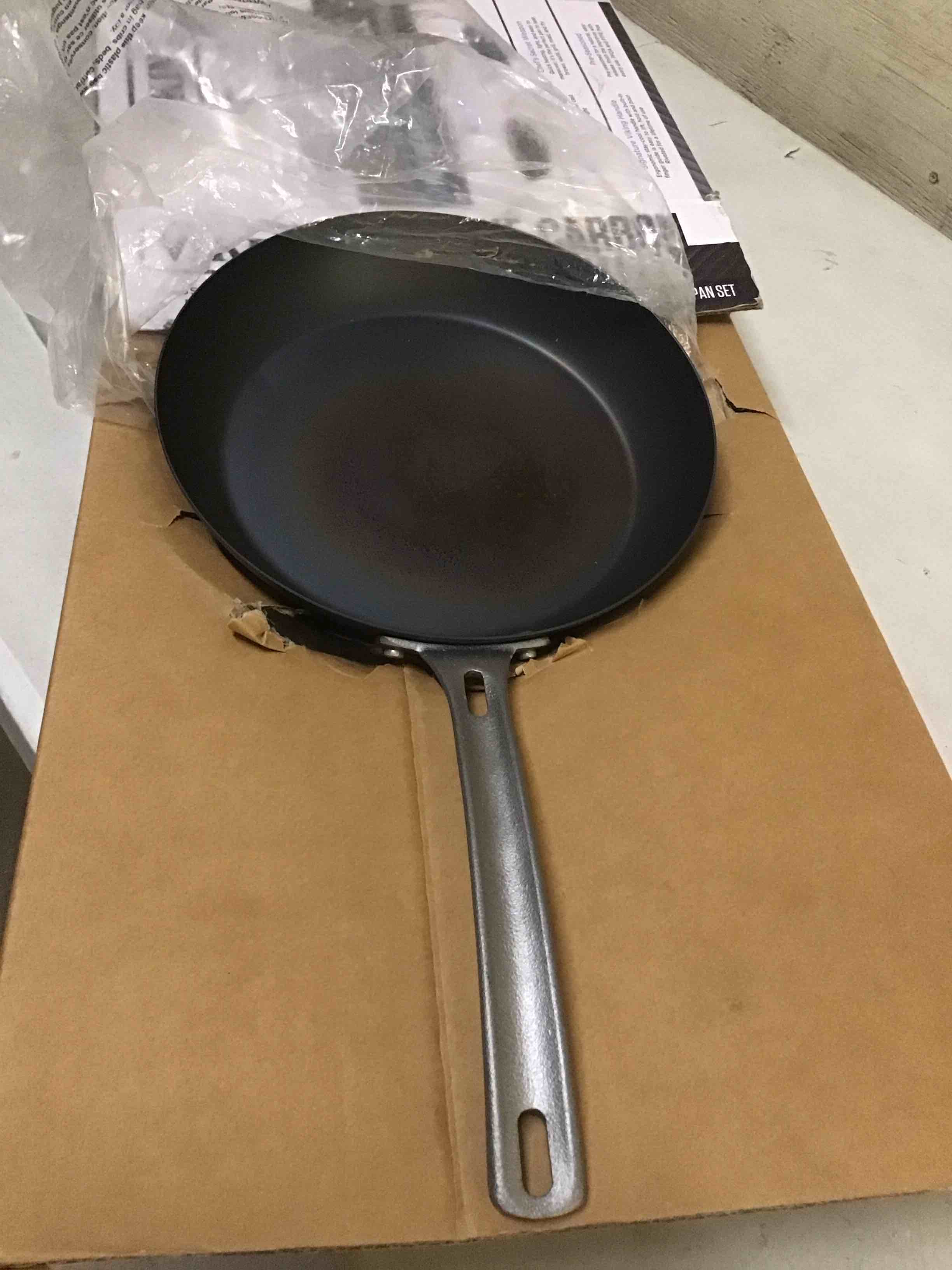 Condition photo showing As Is for viking nonstick frying pans, blue carbon steel kitchen cookware, 10 and 12 inch, black 10 inch and 12 inch frying pan set