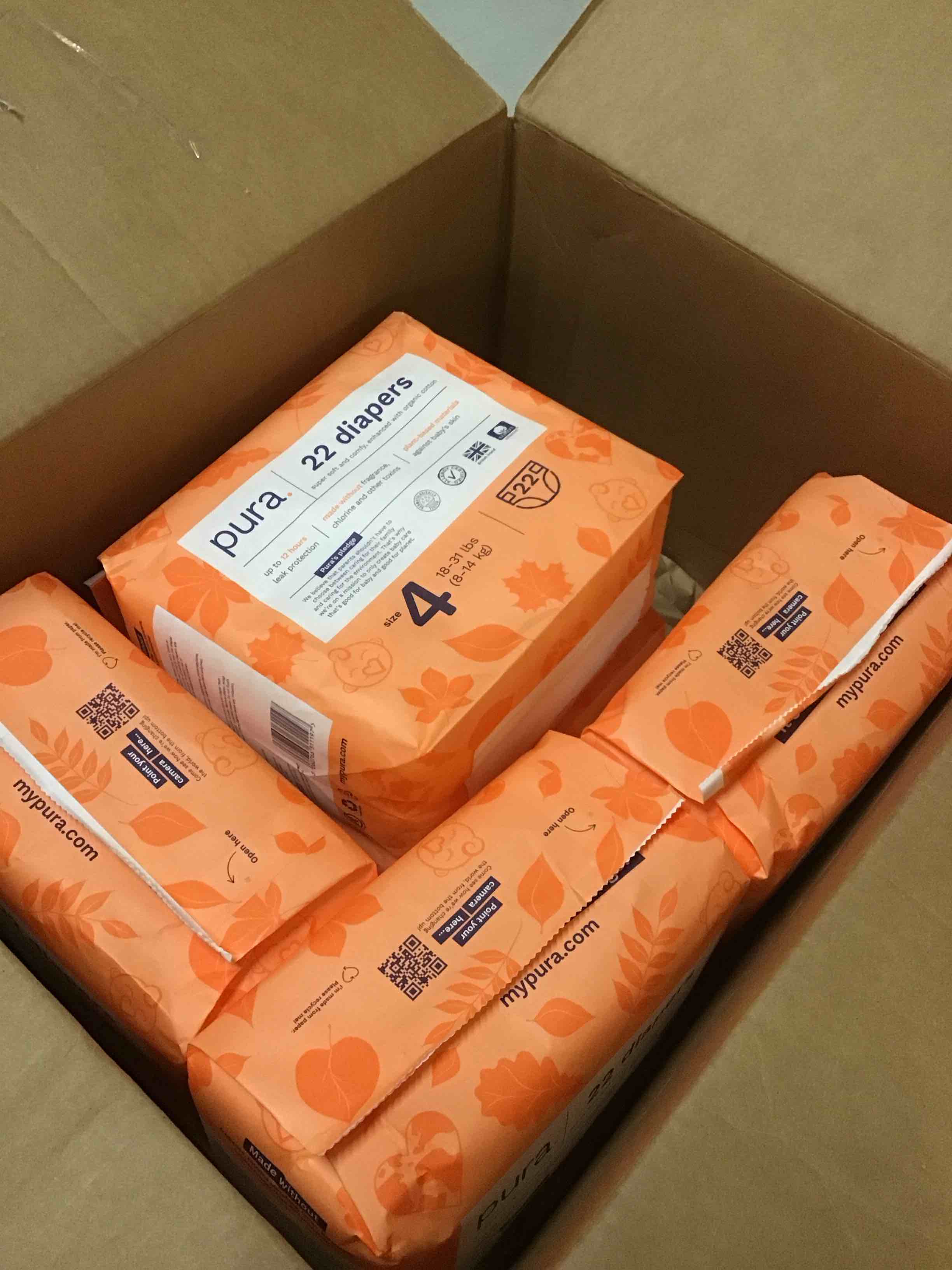 Condition photo showing As Is for ( incomplete) ( one bag is open ) pura sensitive skin baby diapers | size 4 (18-31 lbs) | hypoallergenic, totally chlorine free, fragrance free, up to 12-hour leak protection | 6 packs of 22 (132 diapers)