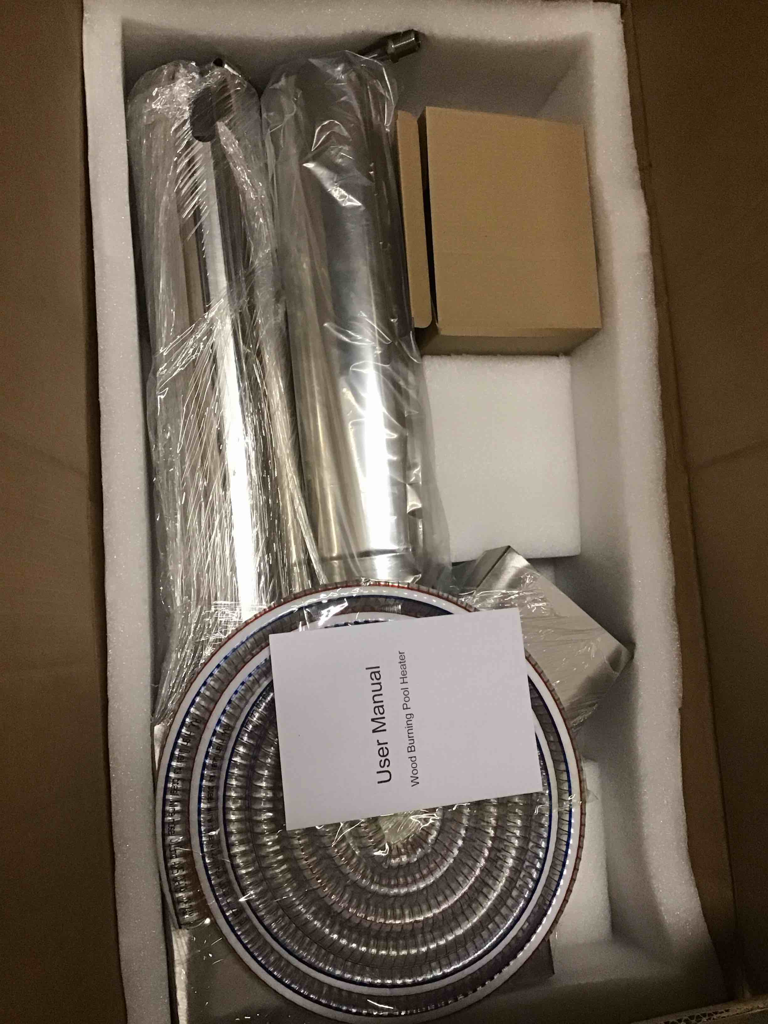 Condition photo showing New/Like New for outdoor wood fired hot tub heater, wood burning heater for hot tub, titanium coil heat exchanger heating for spas, small swimming pools heating stove